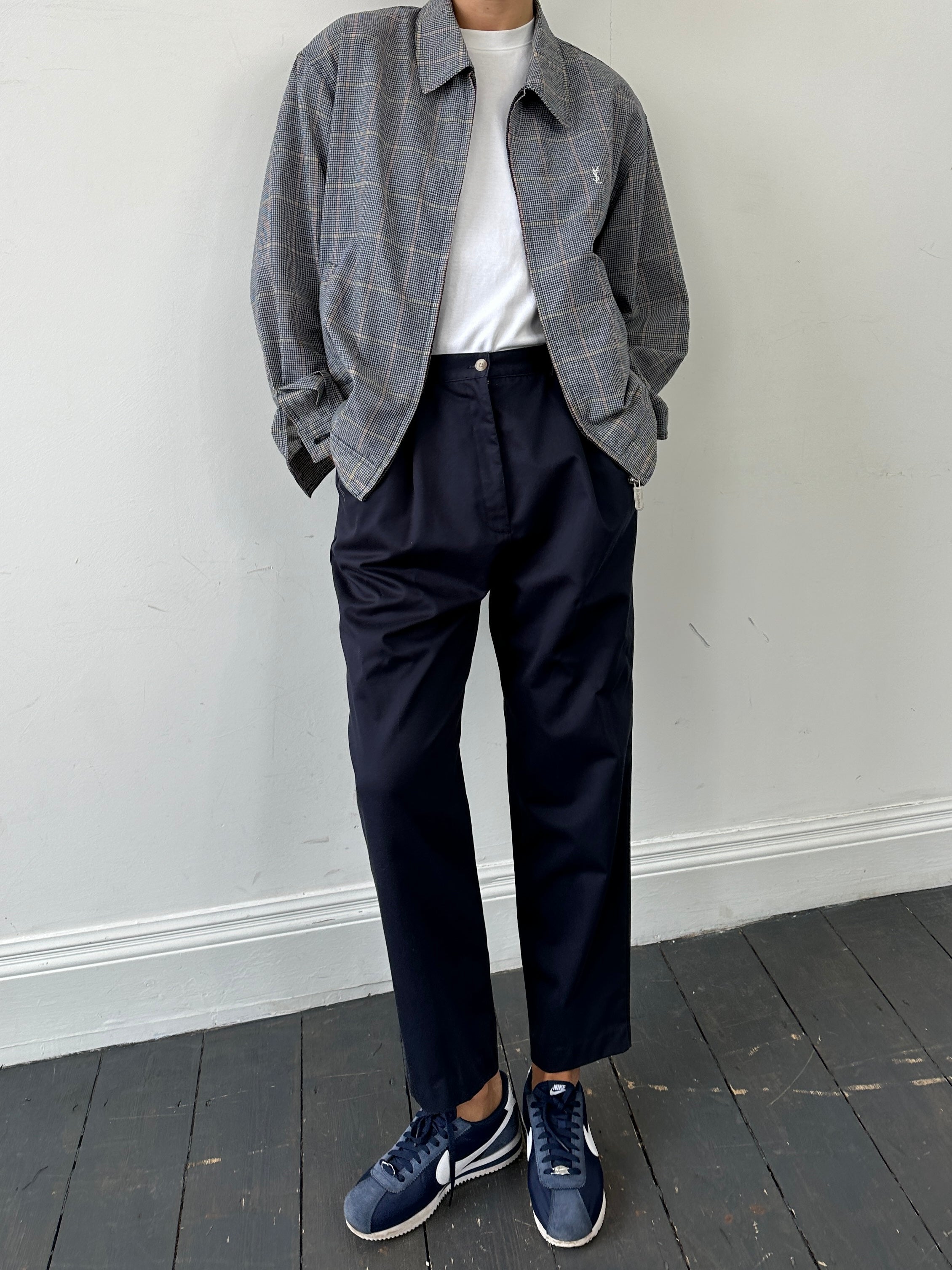 Vintage pure cotton tapered leg pull-on trousers in size W28/30, showing a comfortable fit and classic design.