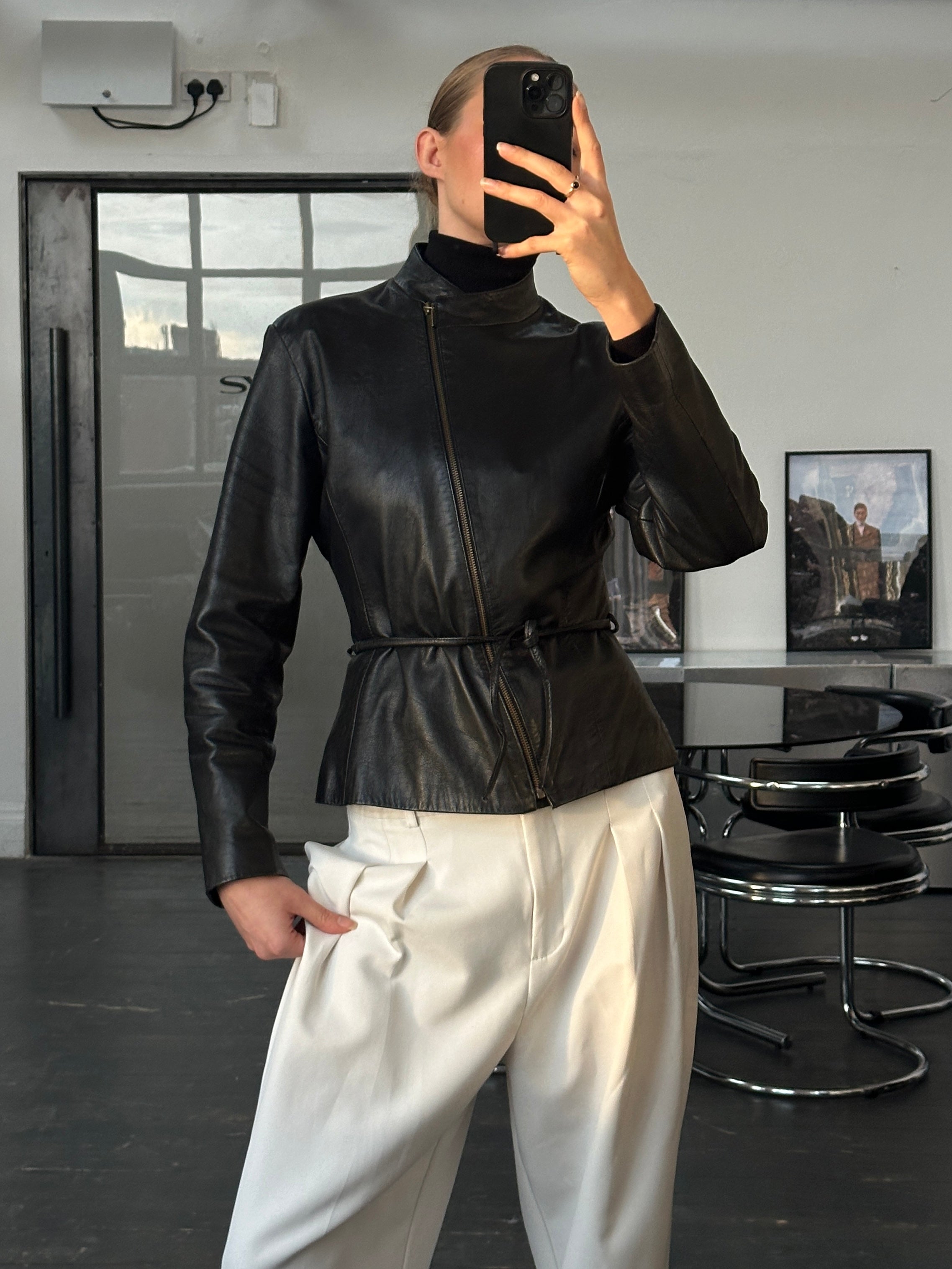 Vintage 2000s asymmetric tie belt leather jacket in size small, featuring distressed brown leather and stylish design details.