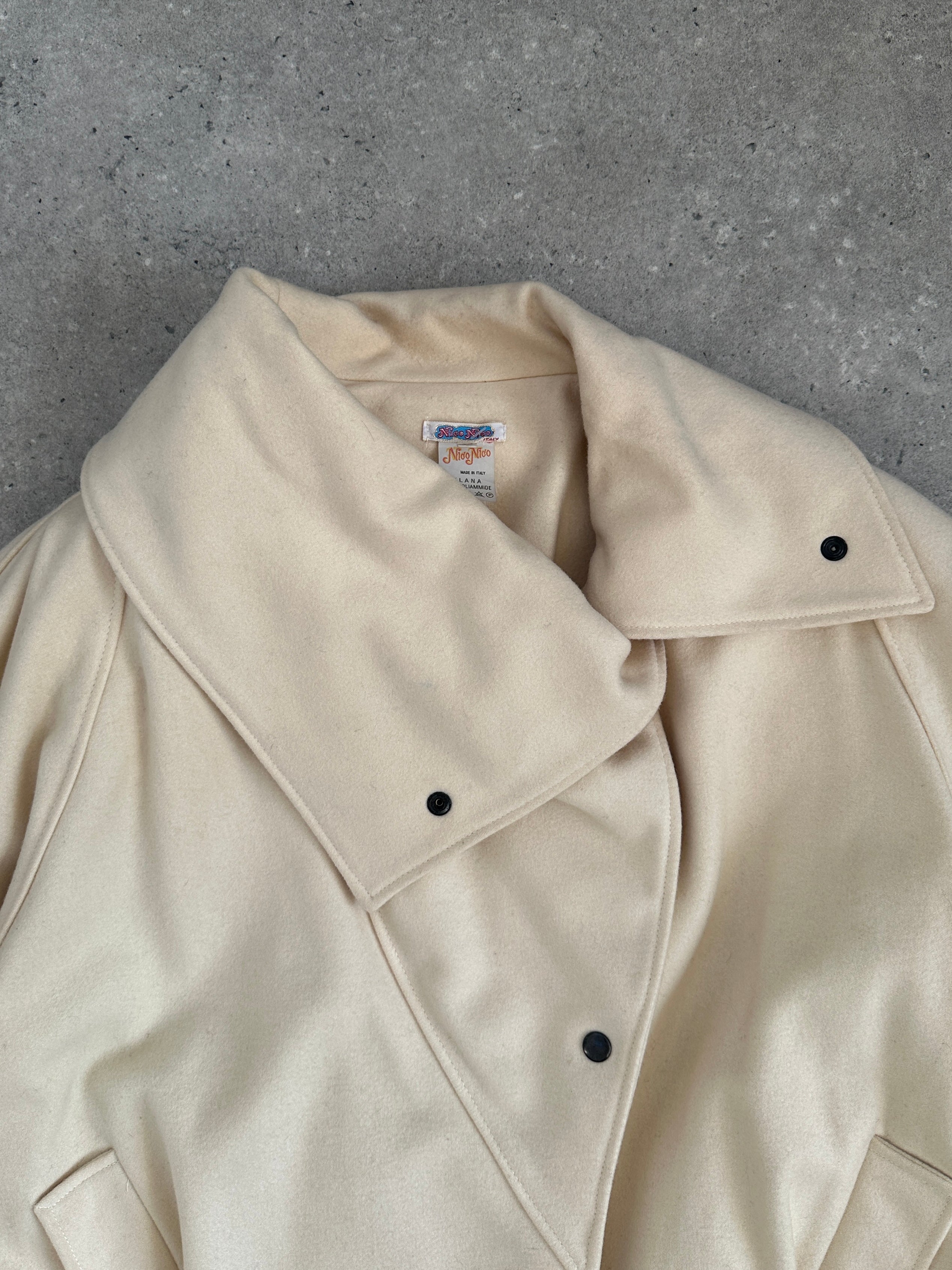Vintage asymmetric wool bomber jacket with funnel neck, in a stylish design, perfect for a classic fall and winter look.