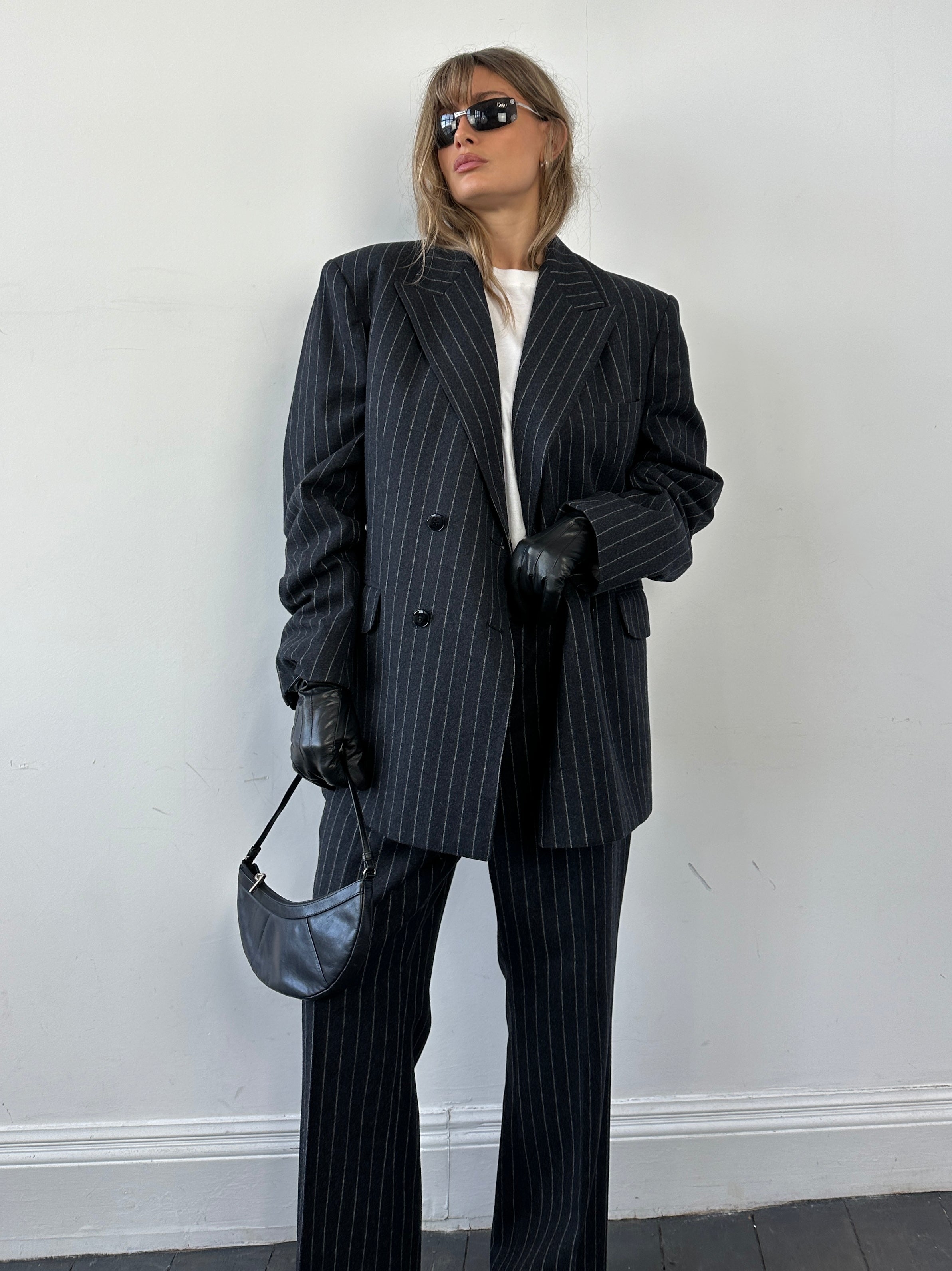 Christian Dior pure wool double-breasted pinstripe suit jumpsuit, tailored fit with lapel collar and button details, size 45L/W32.