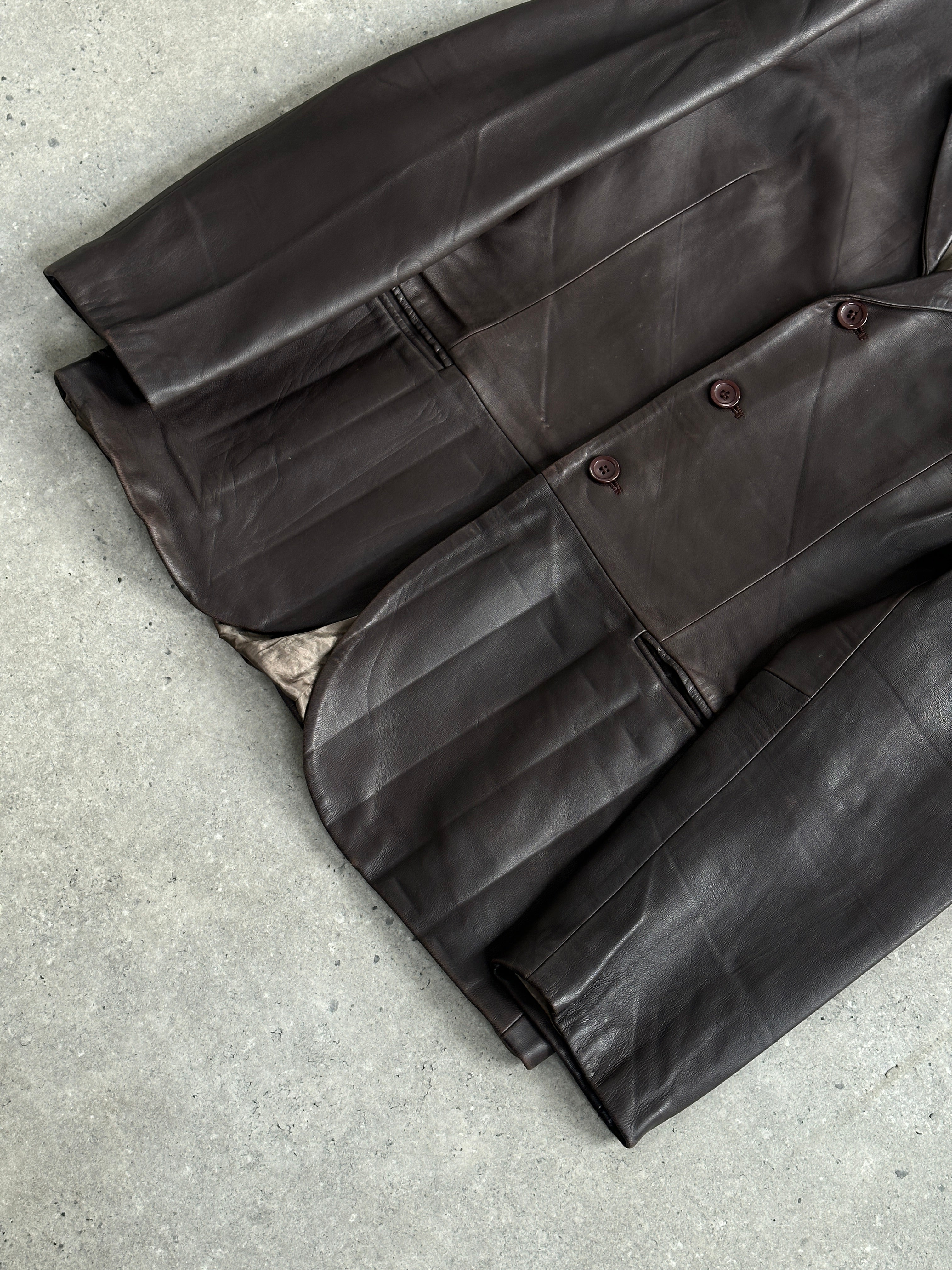 Emporio Armani 1990s lamb leather jacket in black, featuring classic design, zip closure, and stylish details, size M/L.