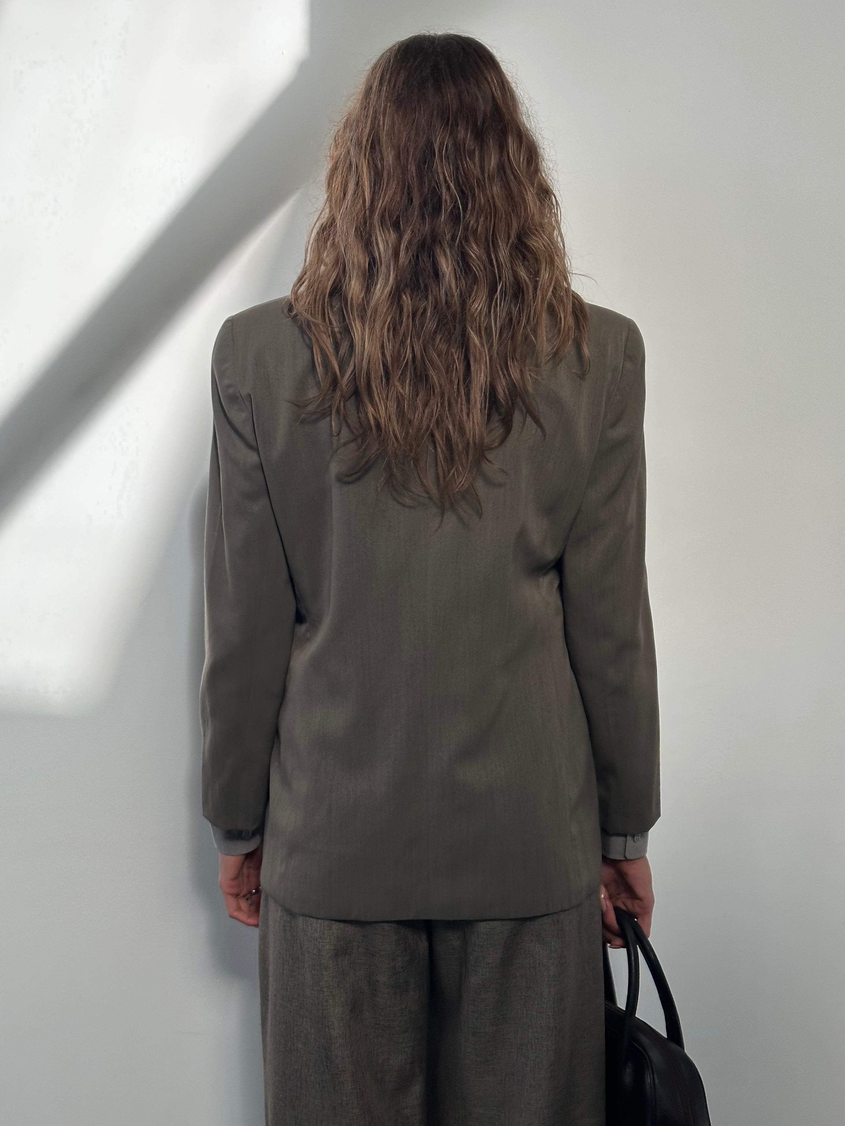 Mani 1990s wool blazer in size S, tailored with a single button, featuring classic 1990s style and structured fit.
