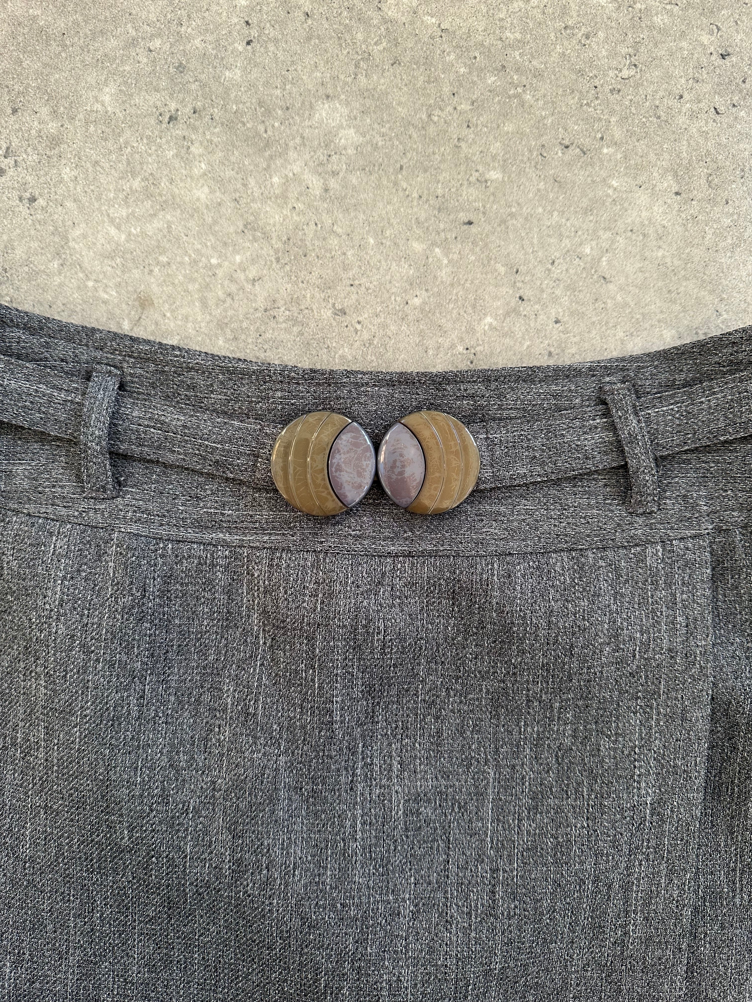 Vintage Italian 1990s mini skirt in classic denim, featuring a high waist and retro styling, perfect for vintage fashion enthusiasts.