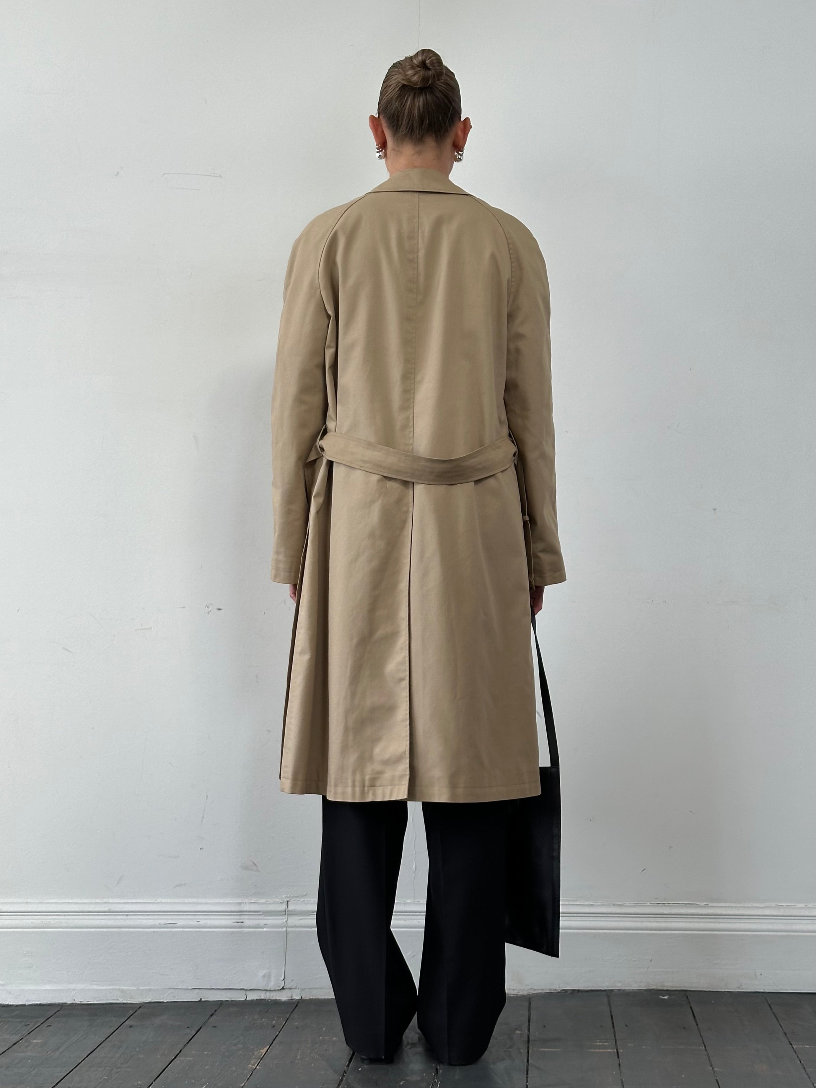 Vintage cotton belted trench coat in XL style, featuring classic design, double-breasted front, and a waist belt for a timeless look.
