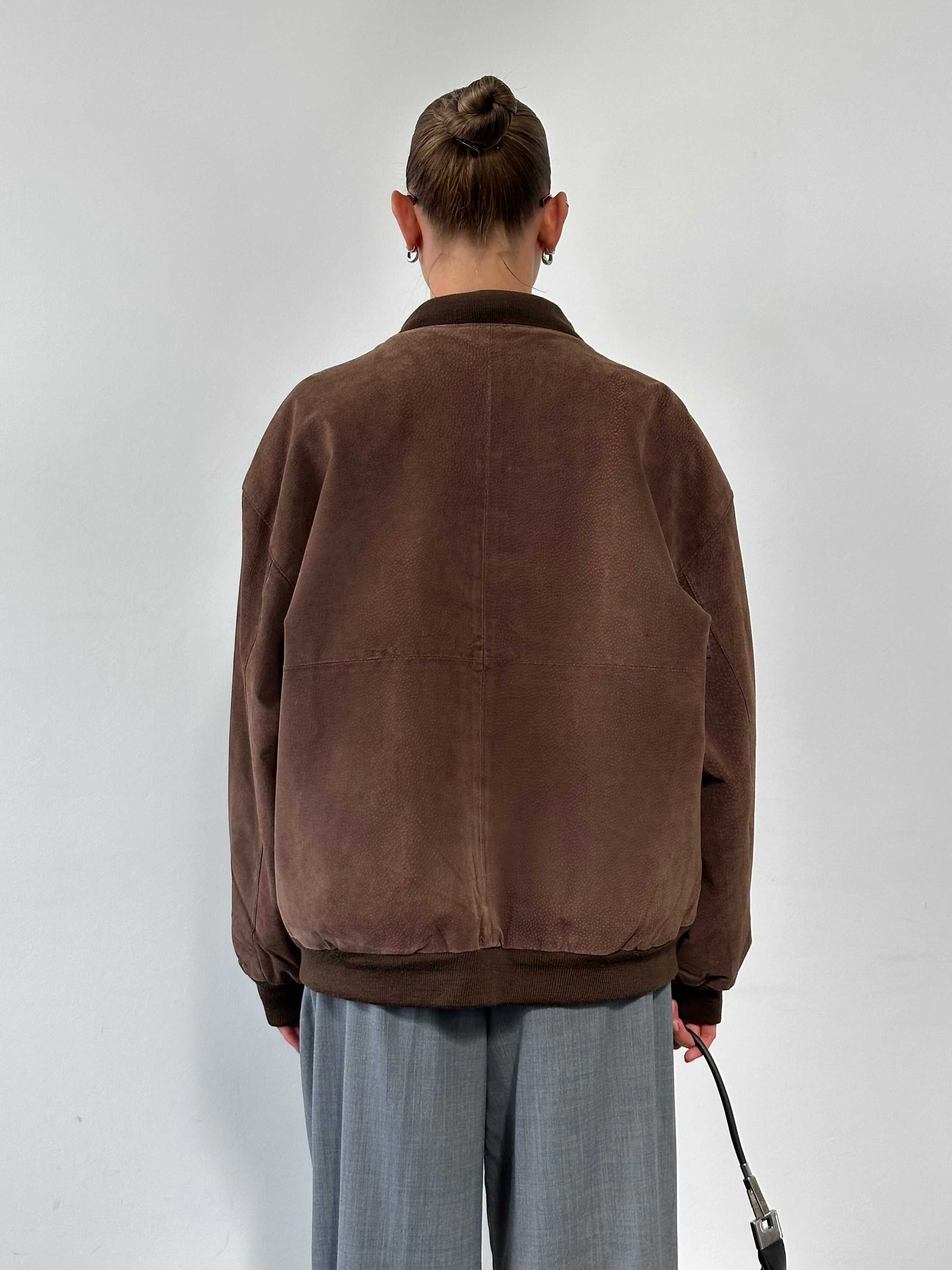 Vintage suede bomber jacket in XL/XXL with classic design and soft texture, featuring ribbed cuffs and collar.
