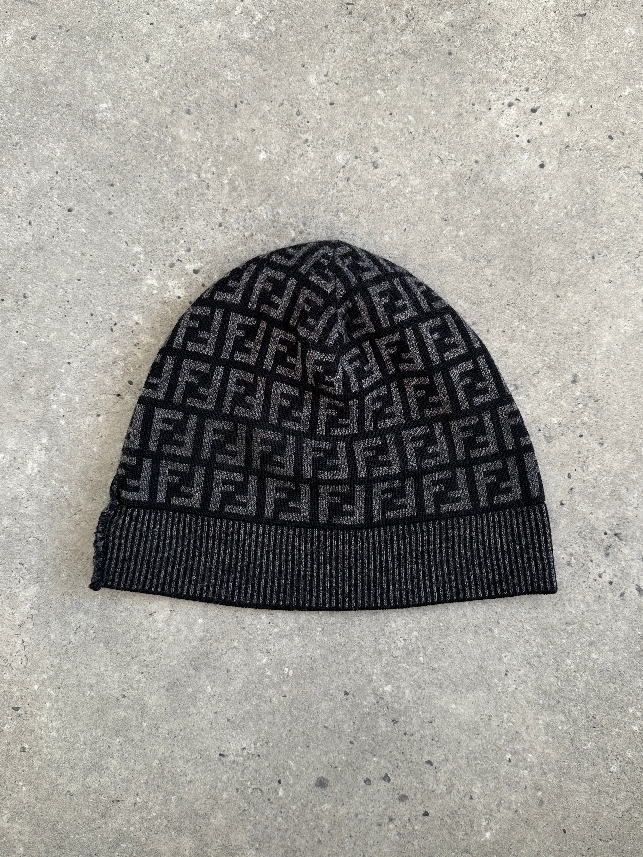 Fendi FF monogram print beanie hat in knit fabric, featuring the iconic logo pattern and a snug, stylish fit.