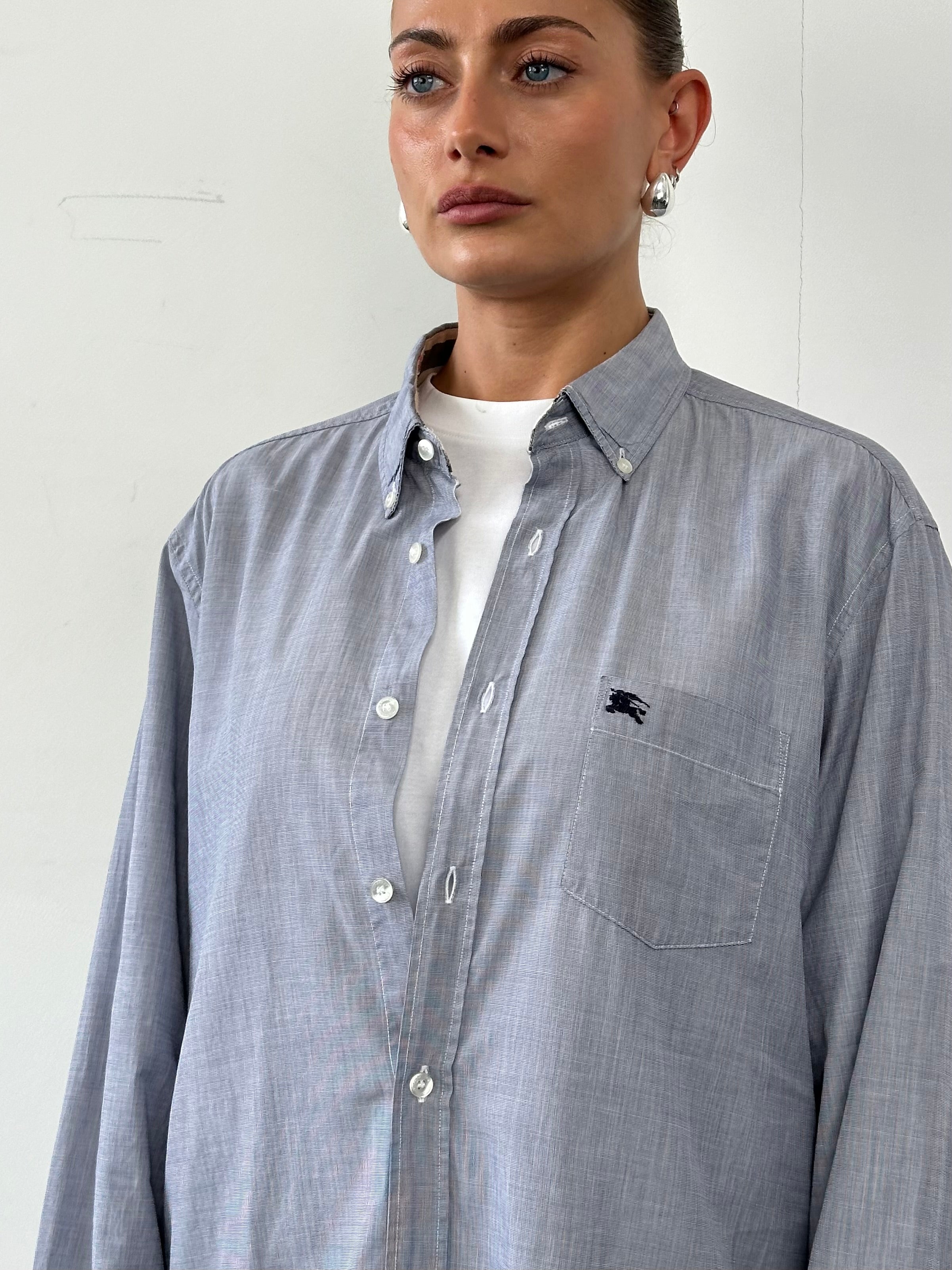 Burberry Brit pure cotton logo shirt in size XL, featuring a classic design and the iconic Burberry logo on the front.