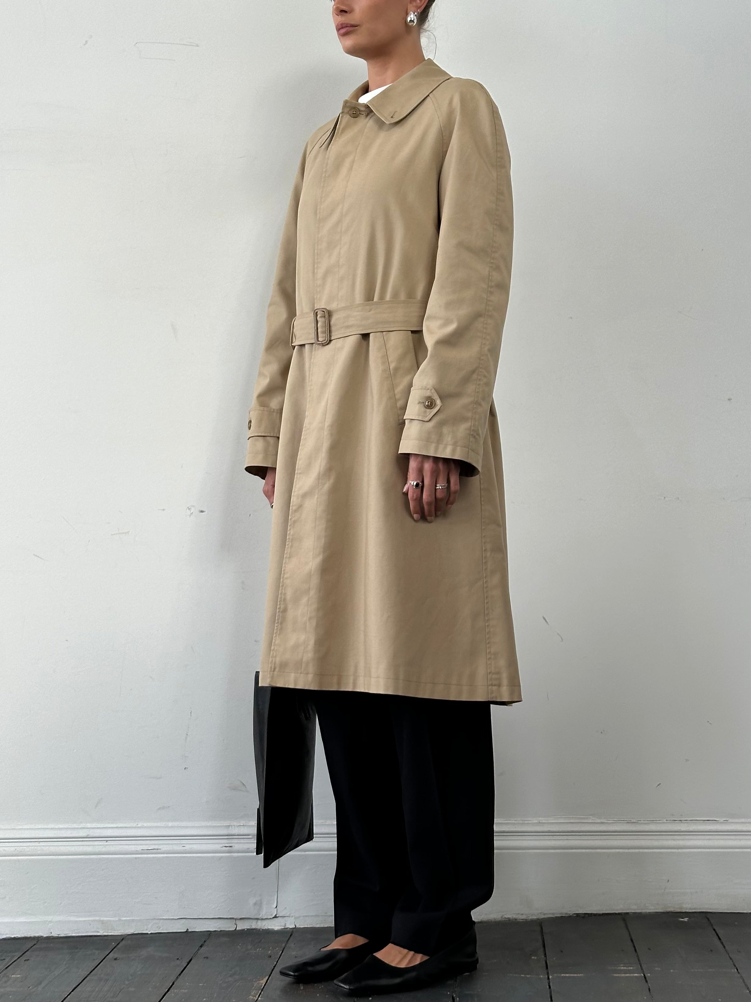 Vintage cotton belted trench coat in XL size, featuring classic design and neutral color, displayed on a hanger.