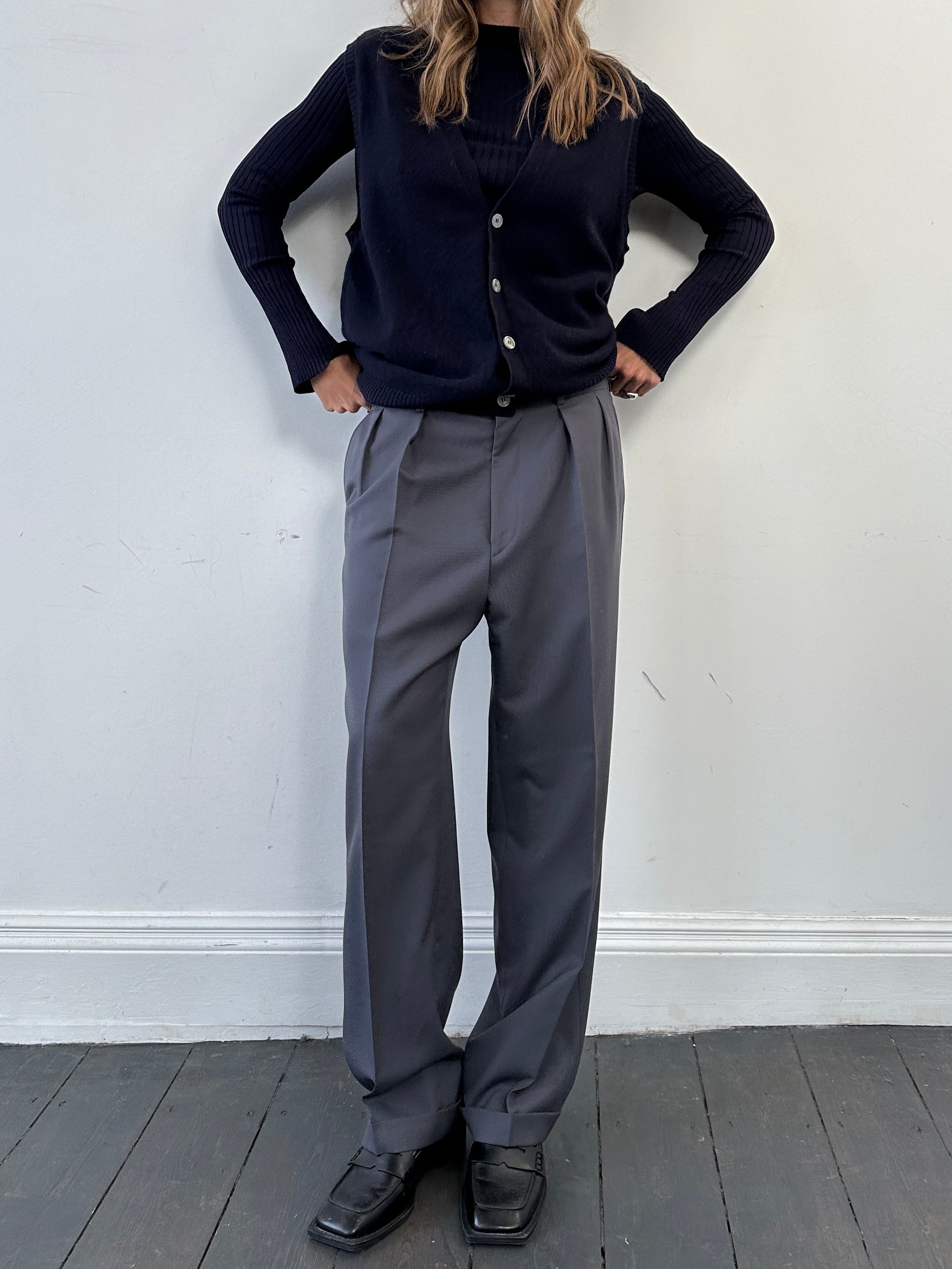 Vintage brand vintage cashmere sleeveless cardigan in size large, soft knit with button closure and classic design.
