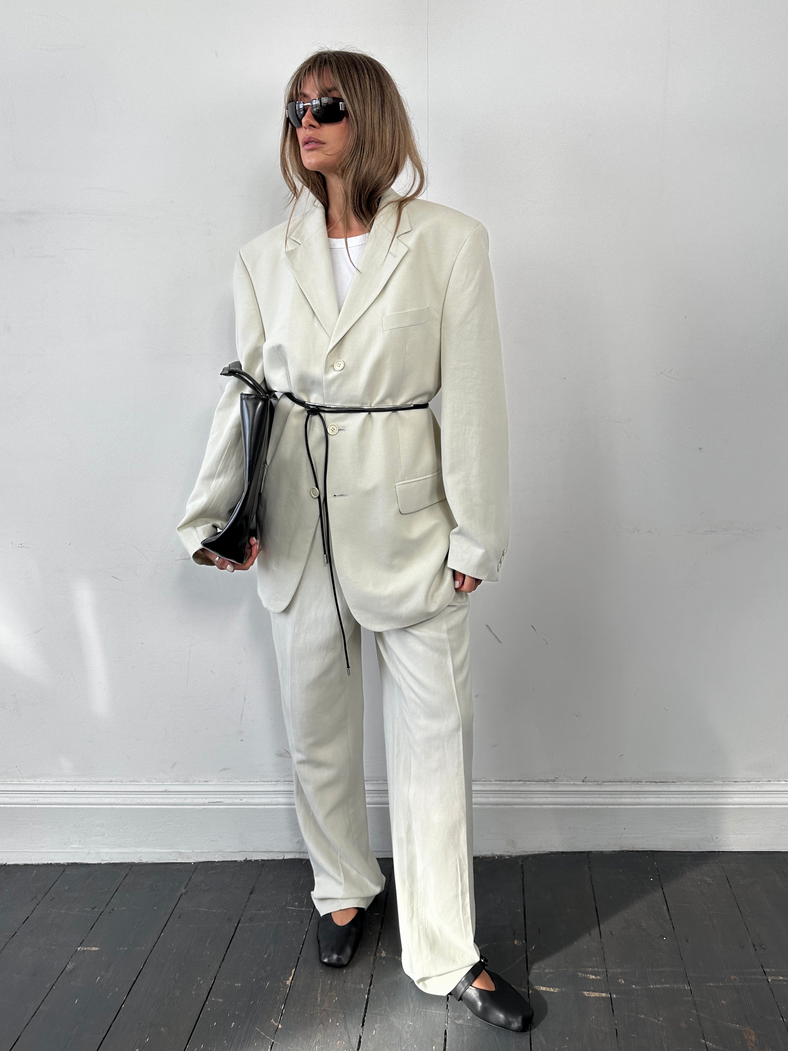 Pierre Cardin linen Tencel single-breasted jumpsuit in size 42L/W34, featuring a stylish, tailored design with lapel collar.