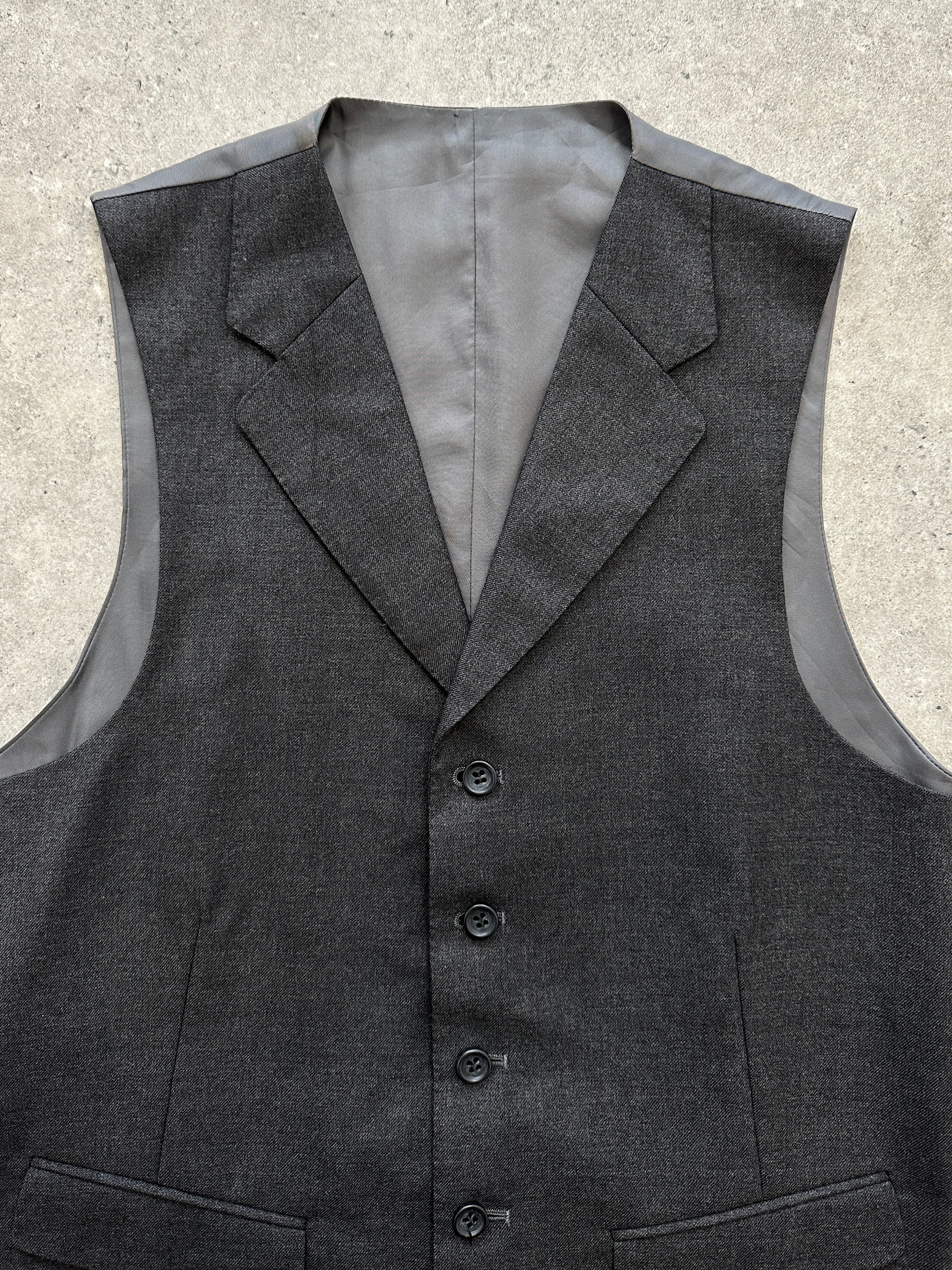Vintage brand vintage collared wool waistcoat, size M, stylish coat with classic design and textured fabric, front view.