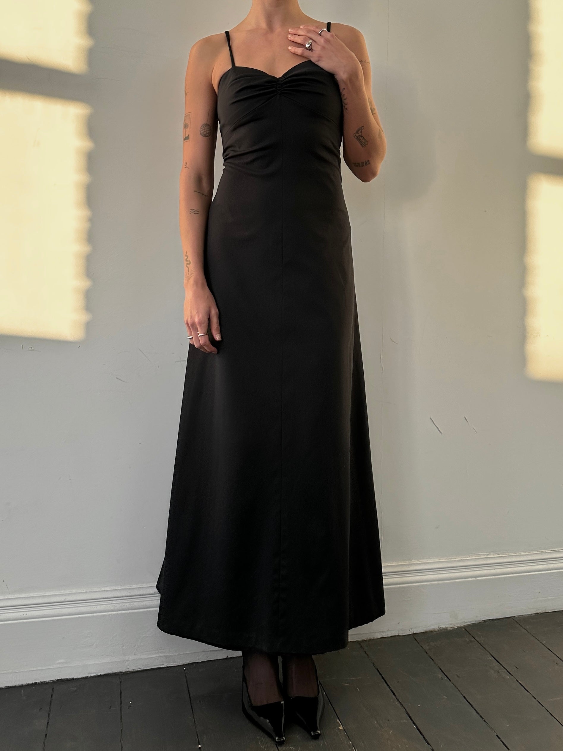 Vintage brand vintage floor-length fitted cami dress in S/M size, featuring a sleek, elegant design with a fitted silhouette.
