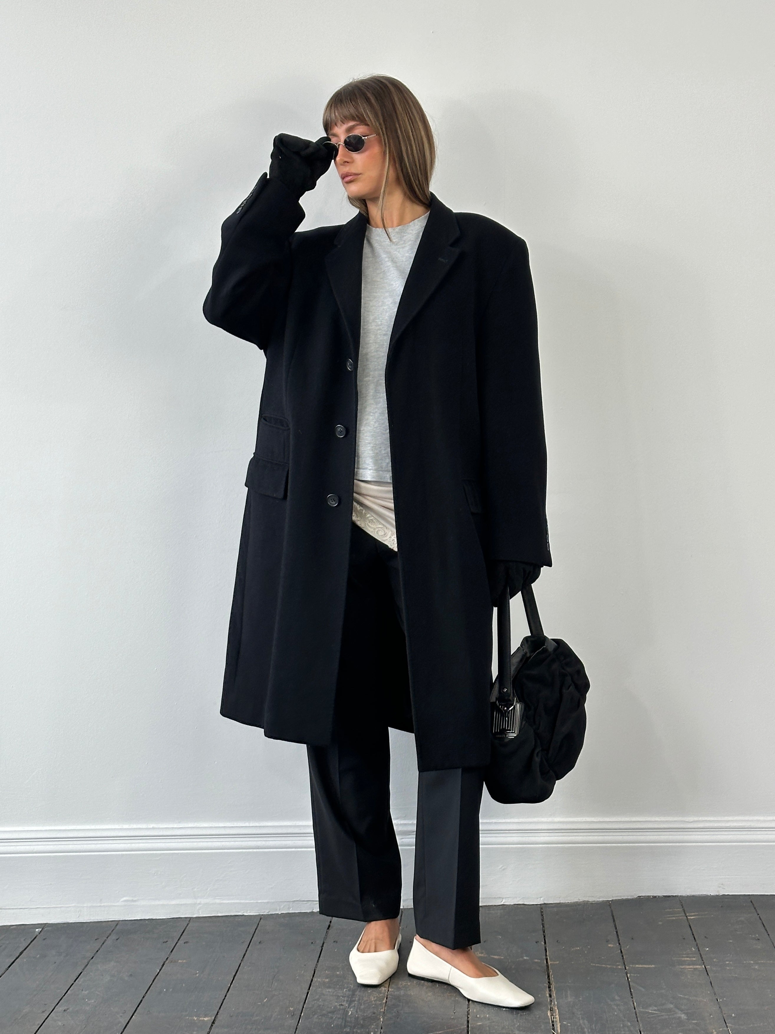 Balmain 1990s wool coat with minimal conceited placket in XL size, featuring a classic tailored design and neutral color.