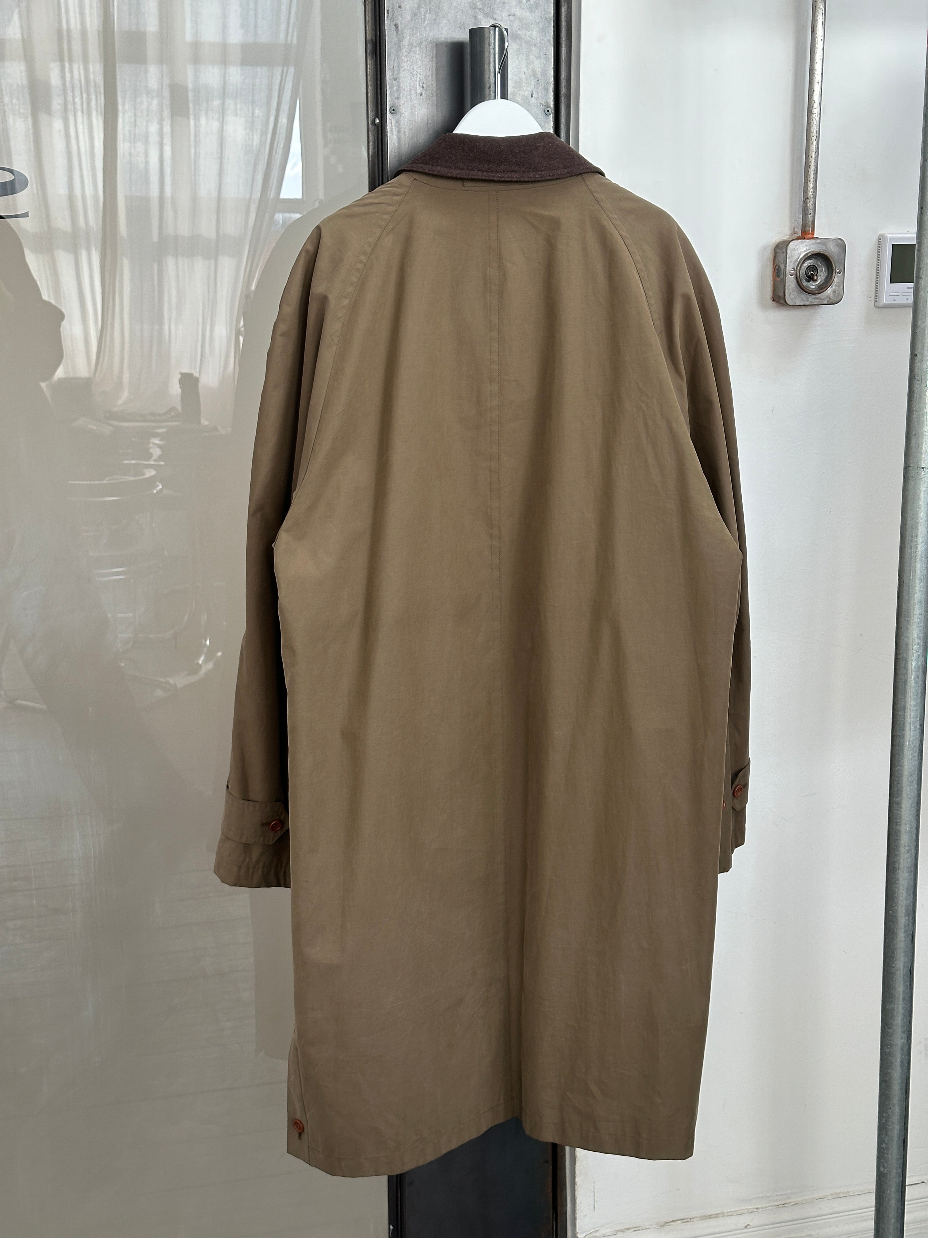 Burberry 1990s cotton field trench coat in XL/XXL, classic beige color, lightweight with button details and belted waist.
