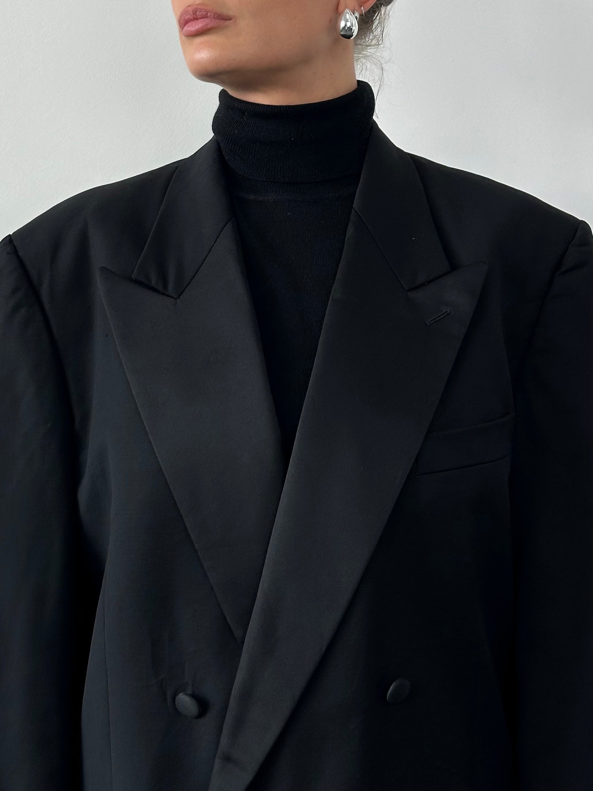 Giorgio Armani double-breasted blazer in size large/x-large, tailored black blazer for formal occasions, stylish men's apparel.
