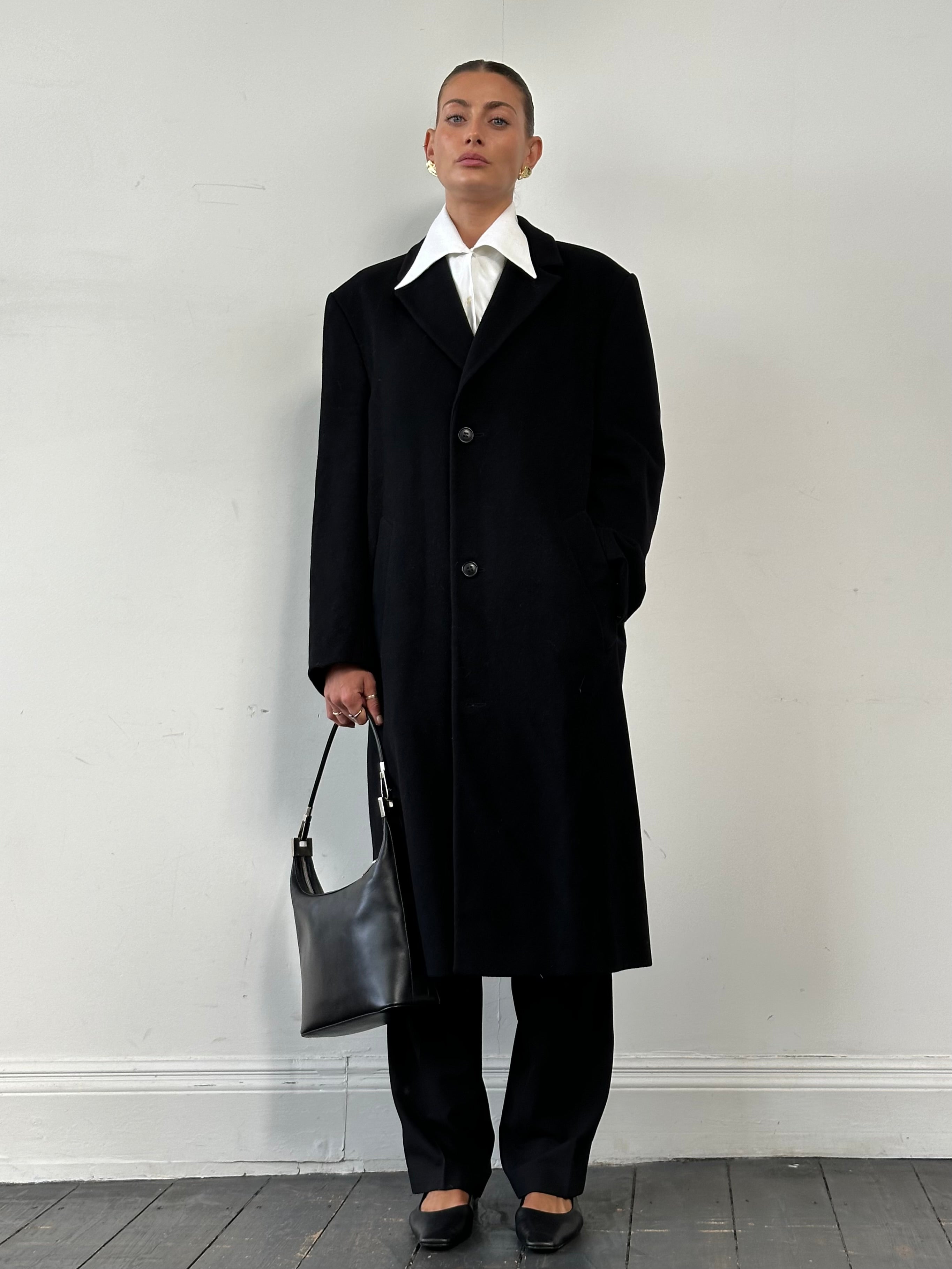 Pierre Cardin wool cashmere single-breasted coat in XL displayed on a hanger, showcasing classic design and luxurious fabric.