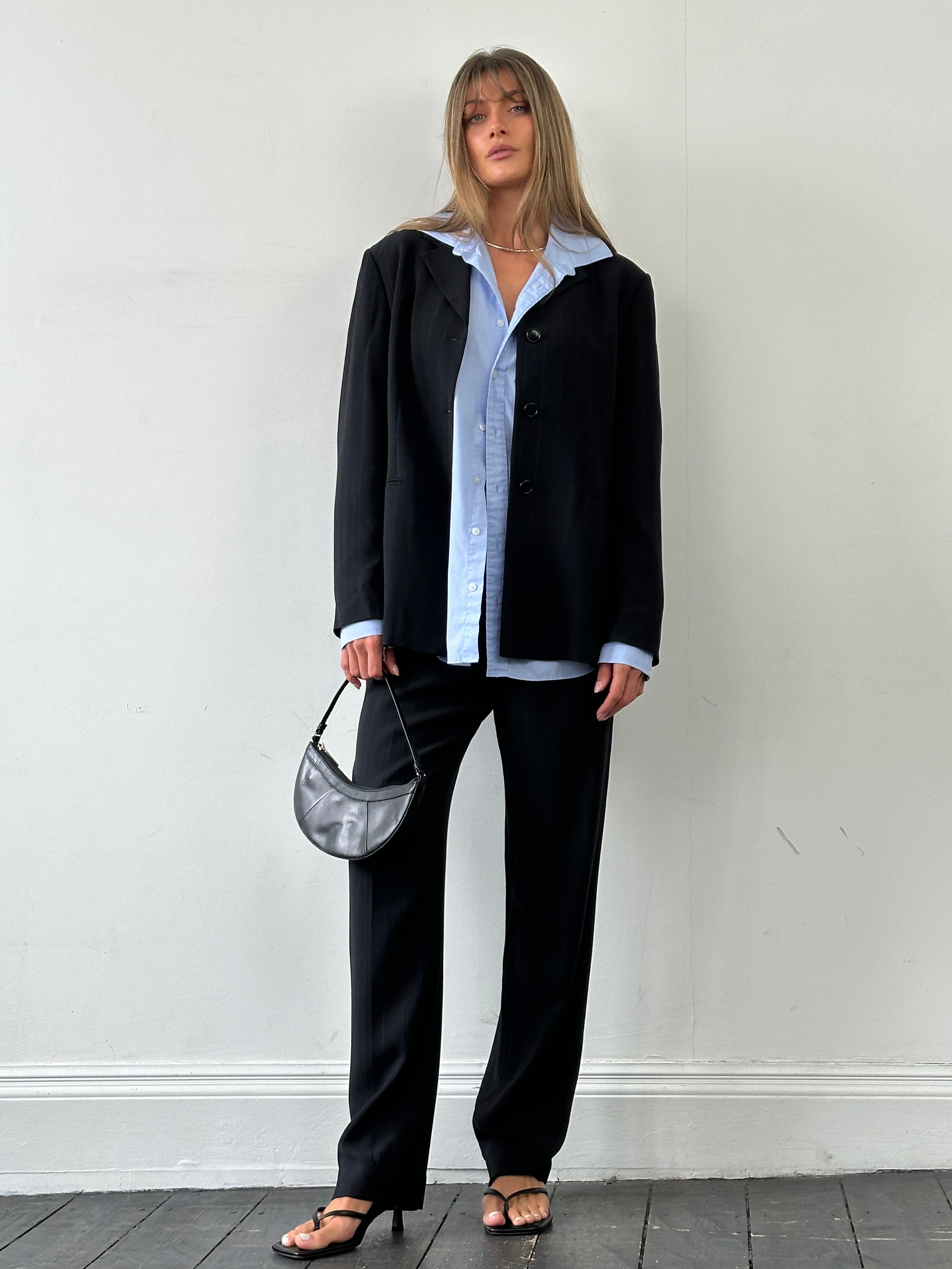 Marella Virgin Wool Blend Jumpsuit with single-breasted design, tailored fit, and wide-leg pants in neutral color.