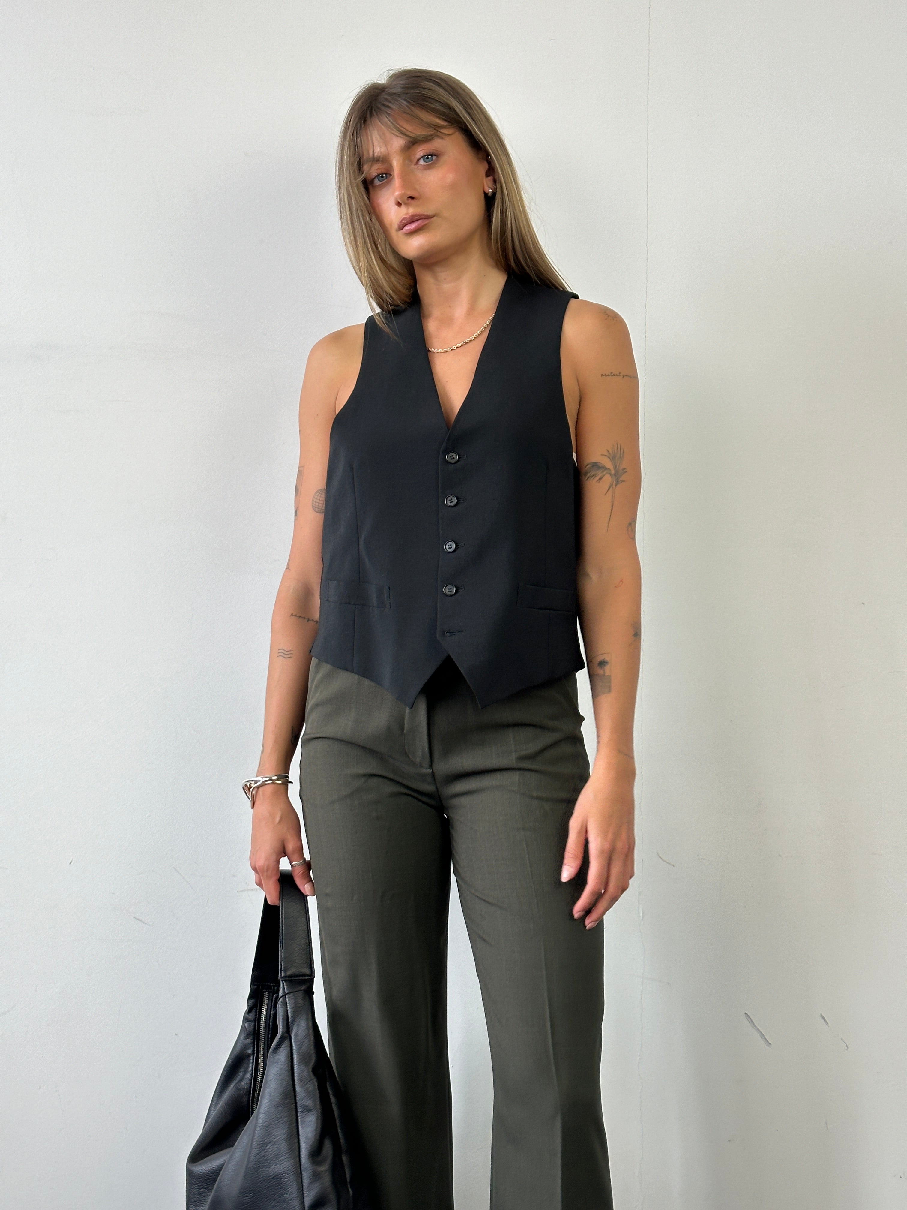 Italian Vintage high-waisted straight-leg tailored trousers featuring a classic fit and vintage fabric, size W26.