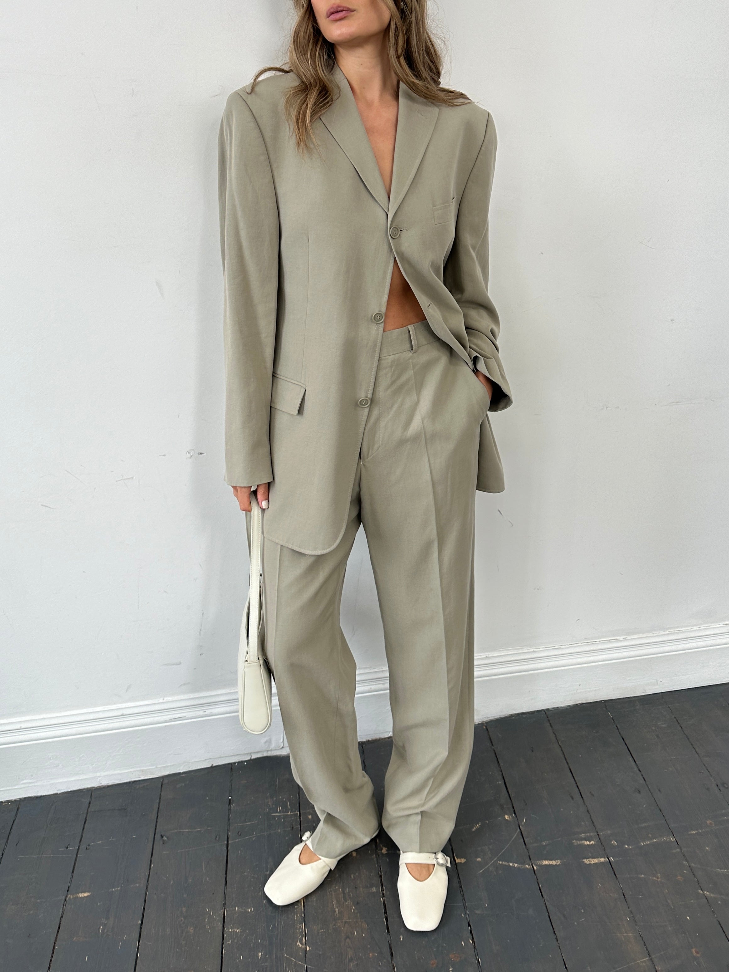 Pierre Cardin lyocell single-breasted suit jumpsuit in size 42R/W34, featuring a sleek design and tailored fit.