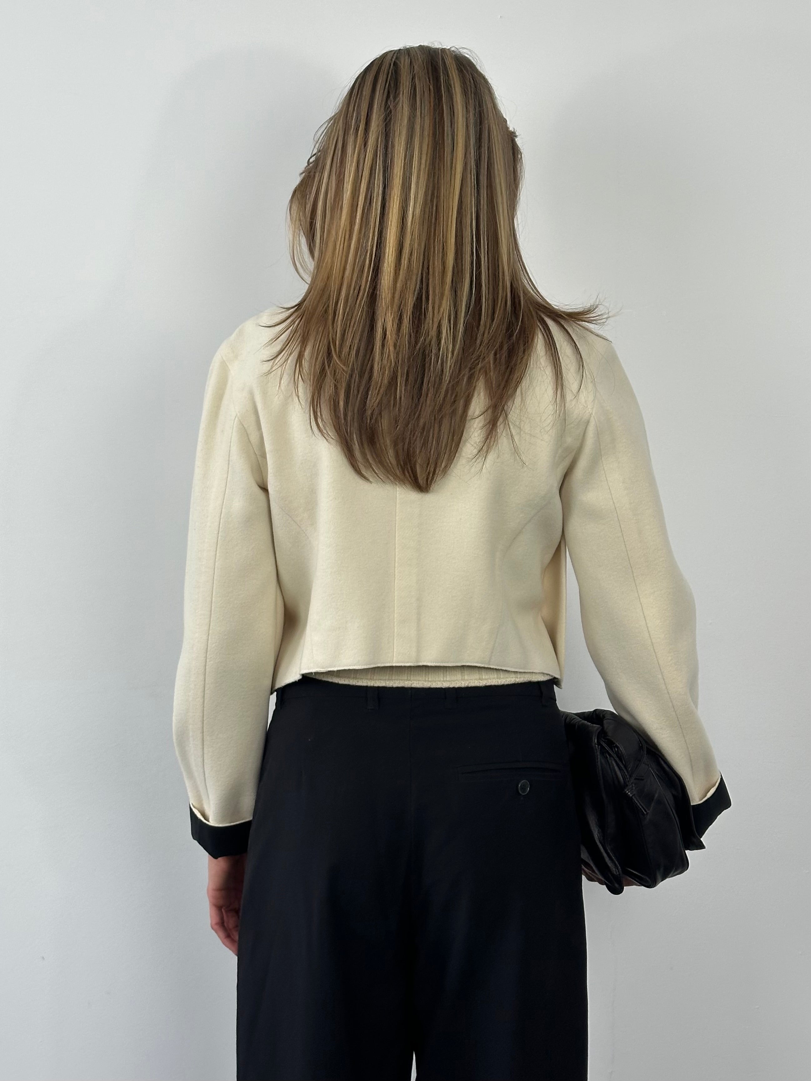 Donna Karan 2000s pure wool cropped jacket, front view showing tailored fit and classic design in natural light.