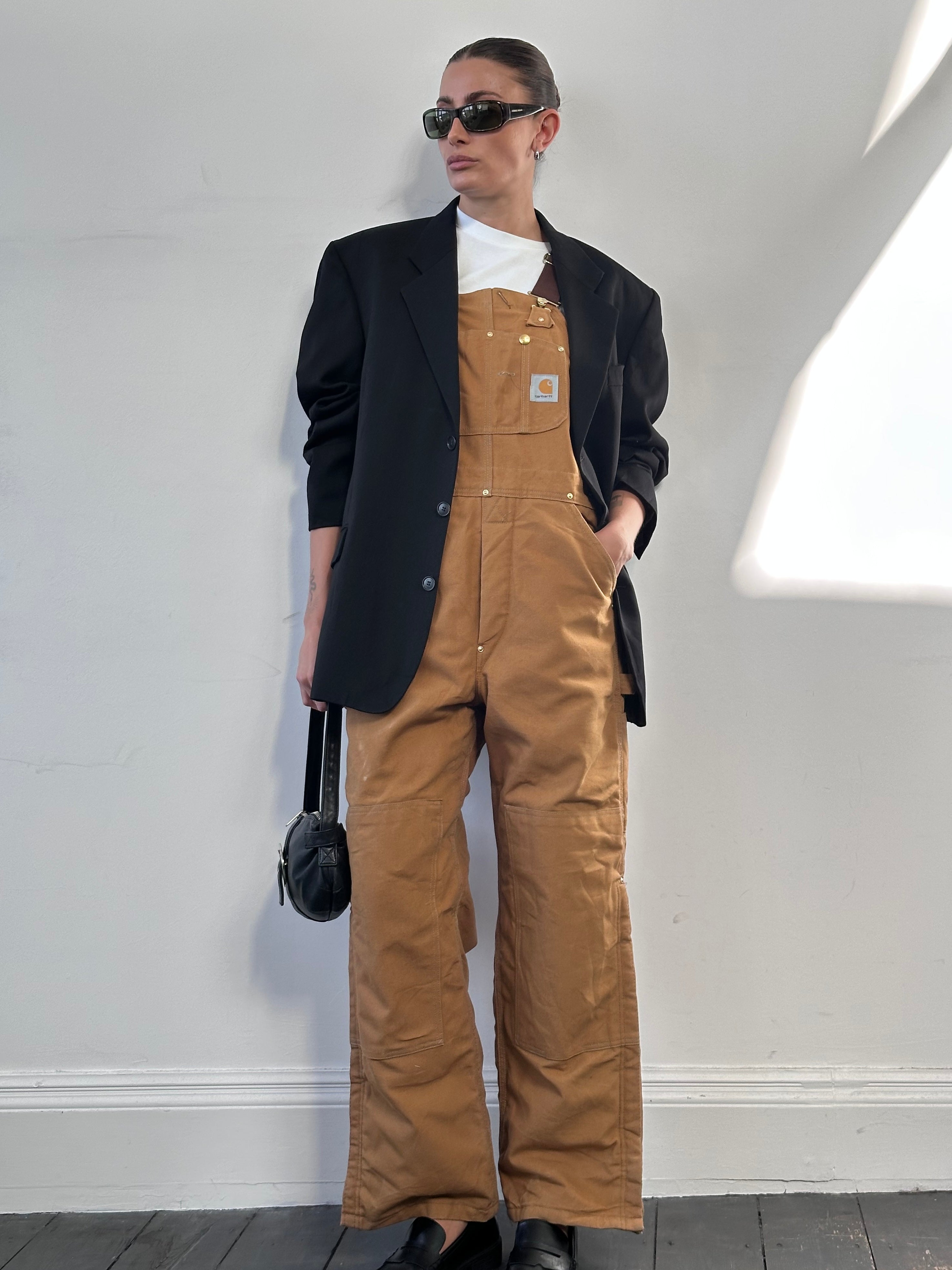 Carhartt pure cotton dungarees in size M, featuring durable fabric and classic design, suitable for work or casual wear.