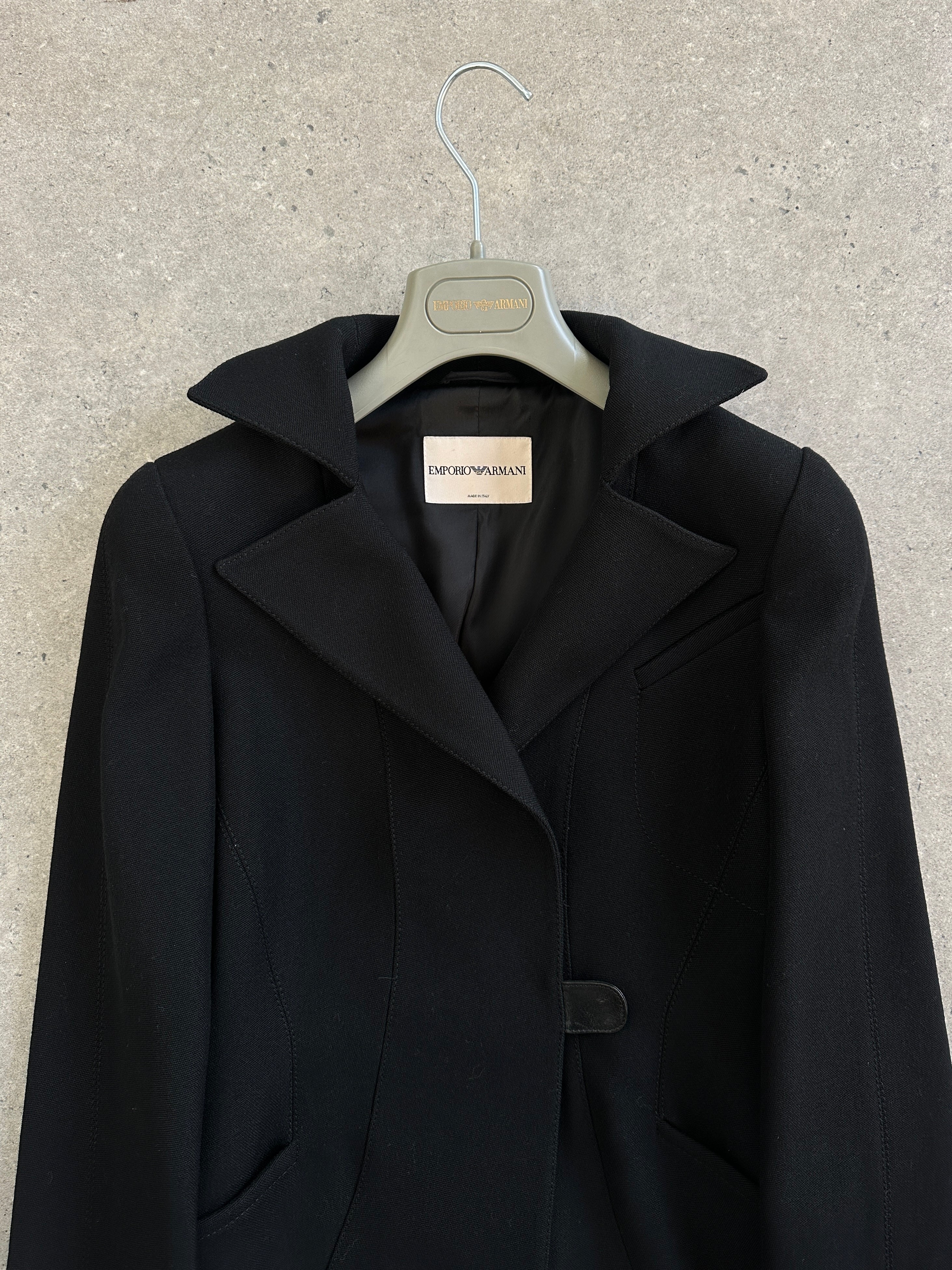 Emporio Armani 2000s pure wool tailored coat in size S, navy blue with classic lapel and button closure, displayed on a hanger.
