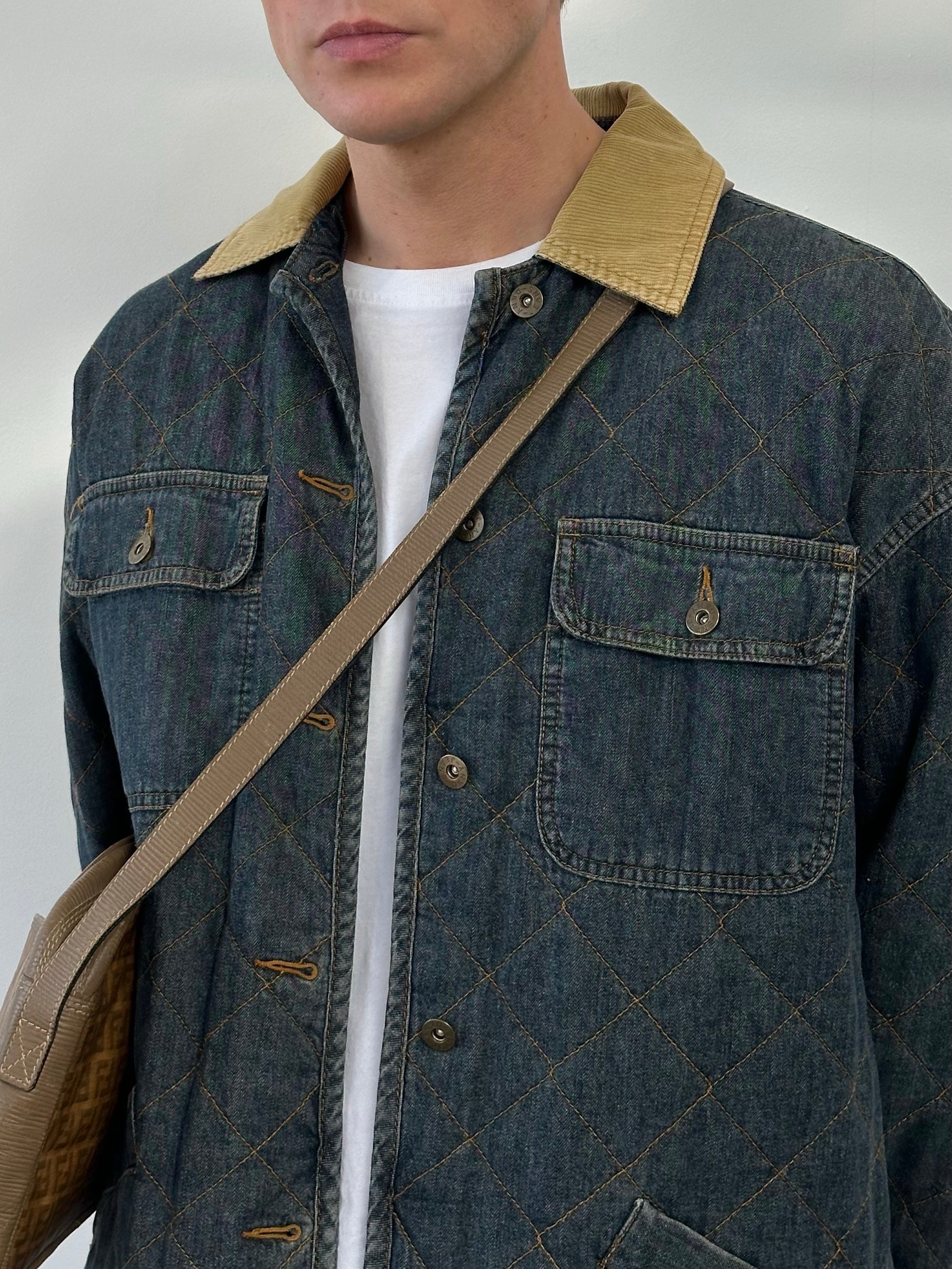 DKNY Jeans 1990s pure cotton jacket in size L, shown on a hanger with a classic denim style and clean design.