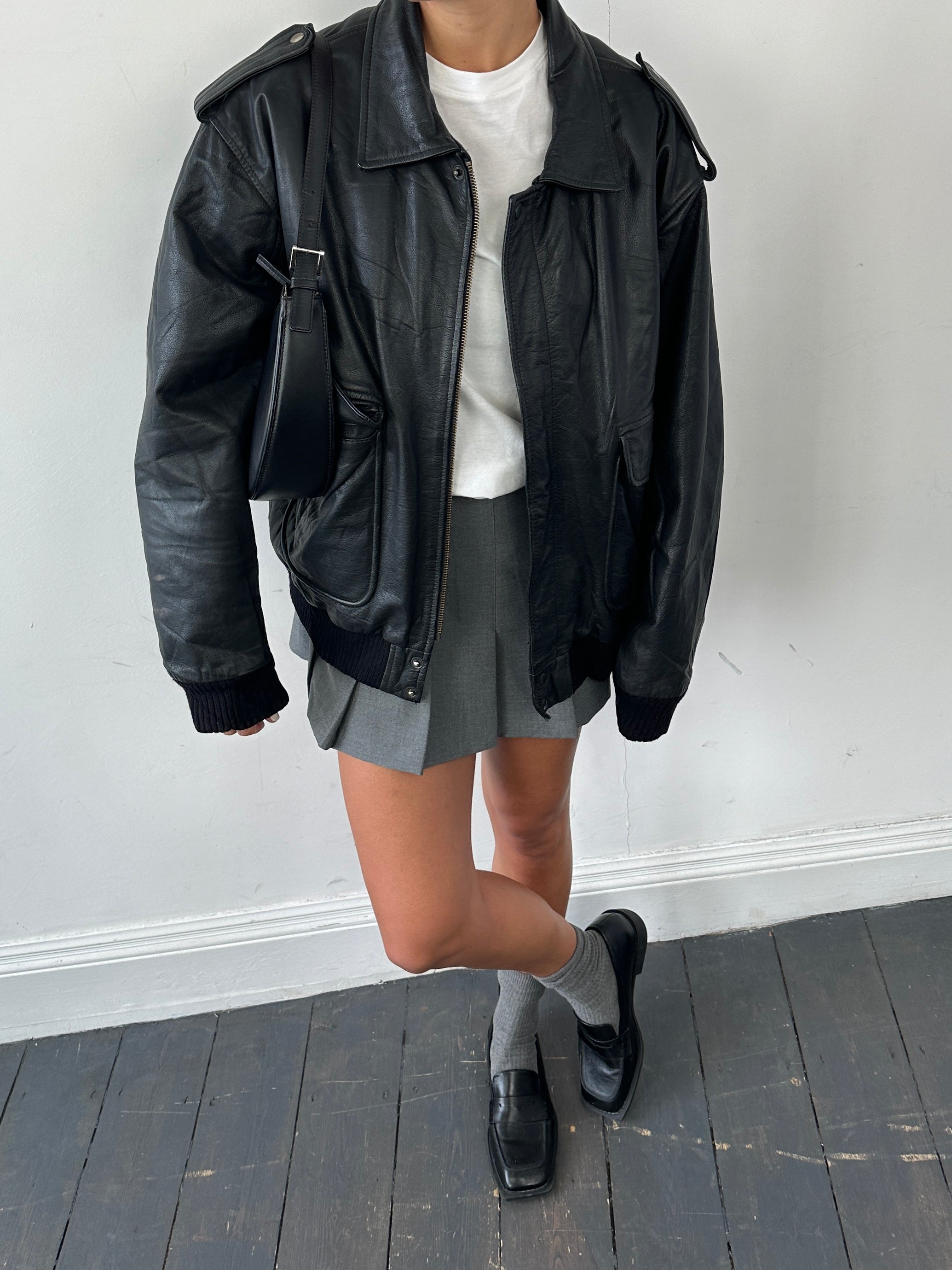 Conbipel men's leather bomber jacket with removable fleece lining, aviator style, in size L/XL, featuring a classic zip front and collar.