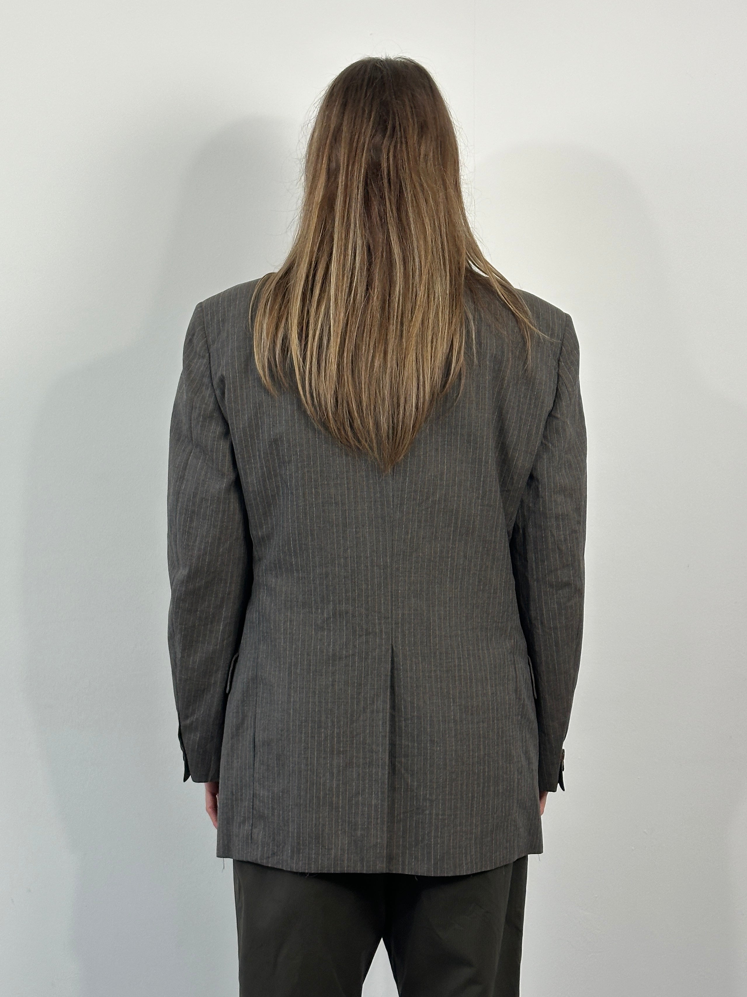 Christian Dior Monsieur 1990s stripe single-breasted blazer in size 40R/L, featuring classic tailored design with bold stripe pattern.