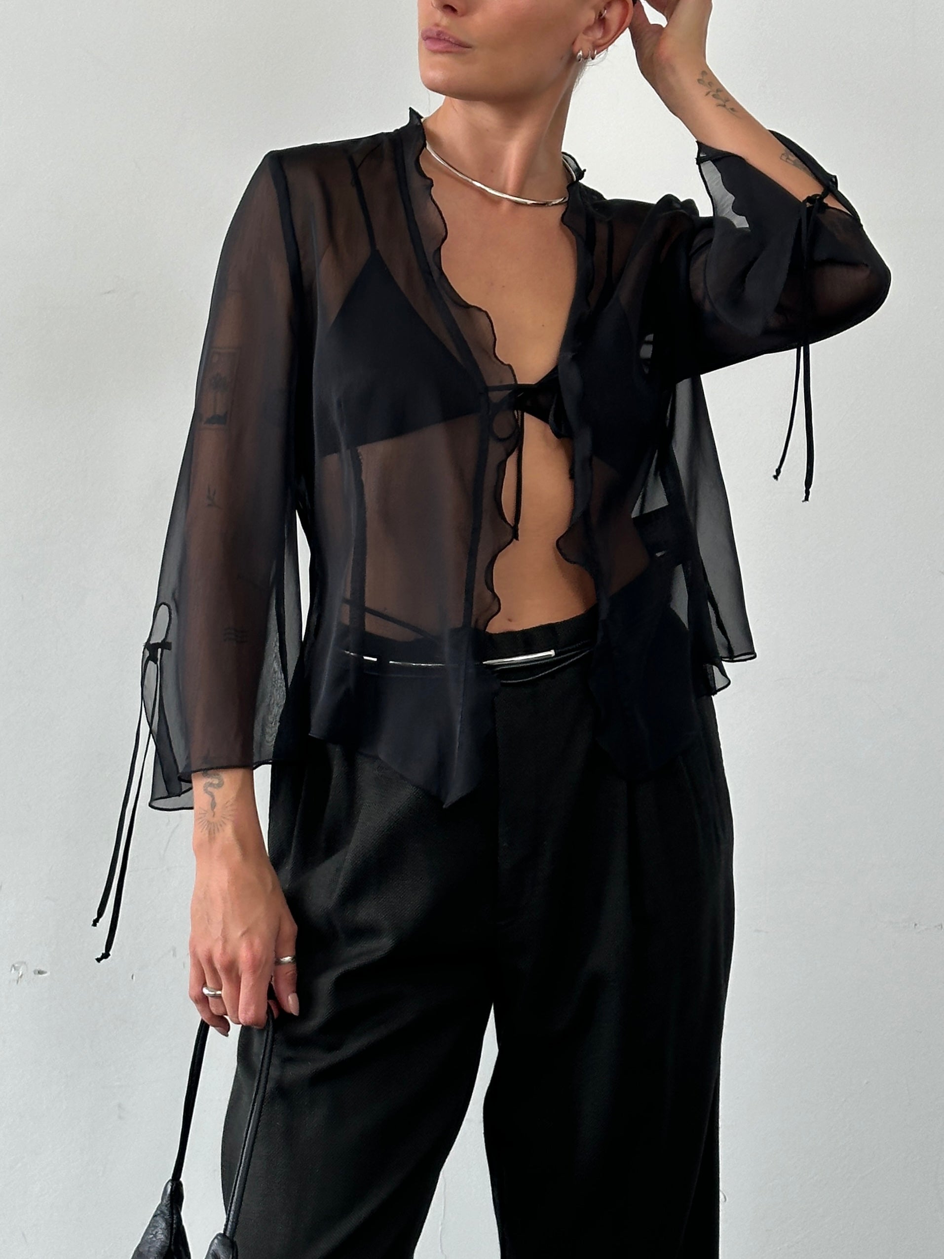 Vintage sheer tie-front cardigan top in size M, featuring a lightweight, see-through fabric with a stylish front tie detail.
