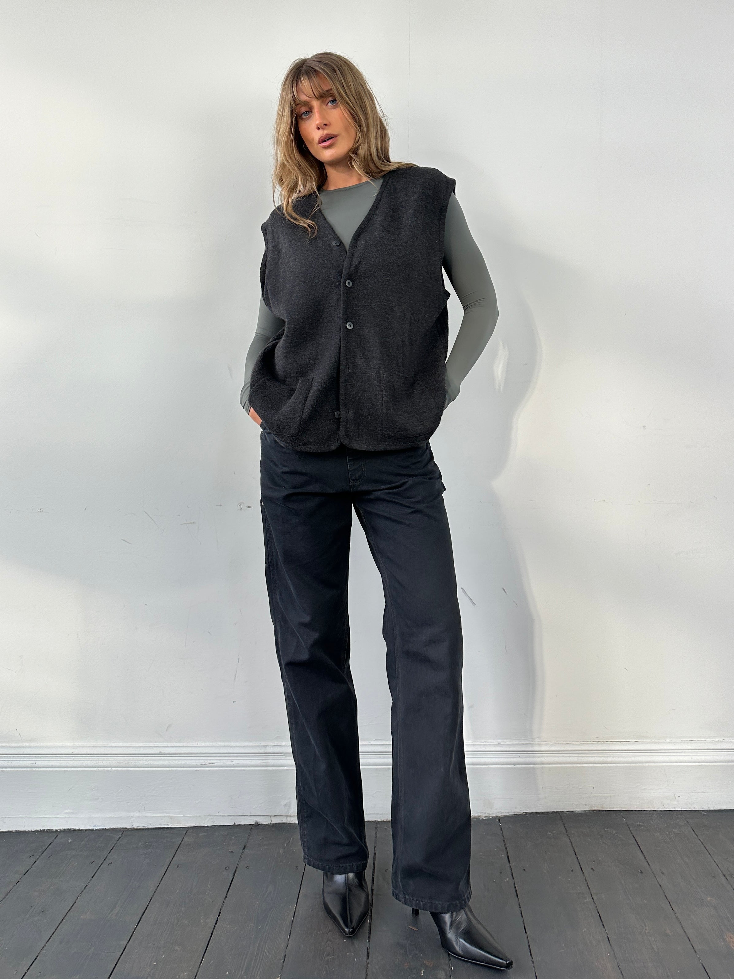 Vintage wool knit waistcoat in size XL, showcasing a classic textured coat with a button-front design and warm, vintage style.