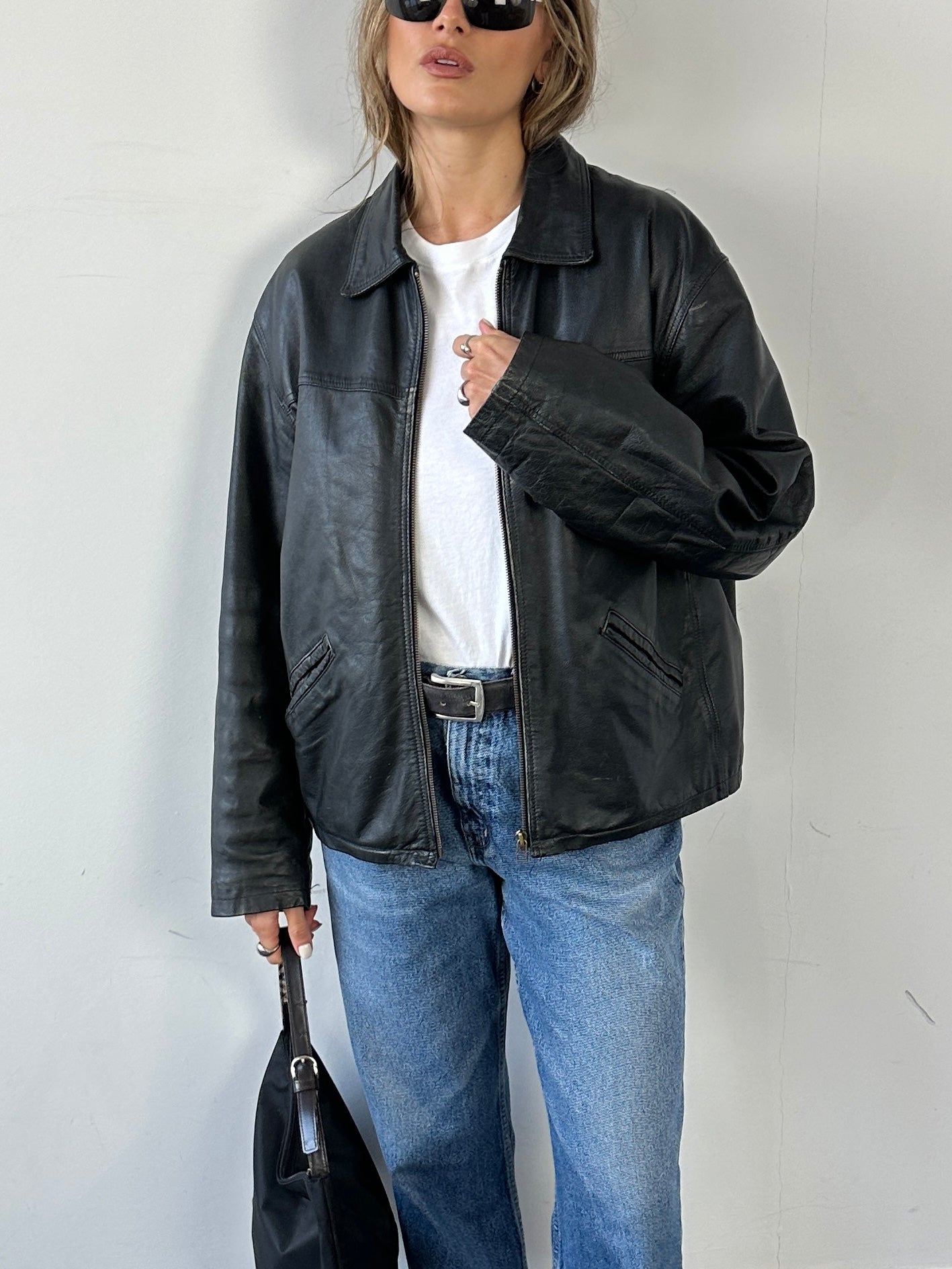 Conbipel distressed leather jacket in size L with rugged design and textured leather, displayed on a plain background.