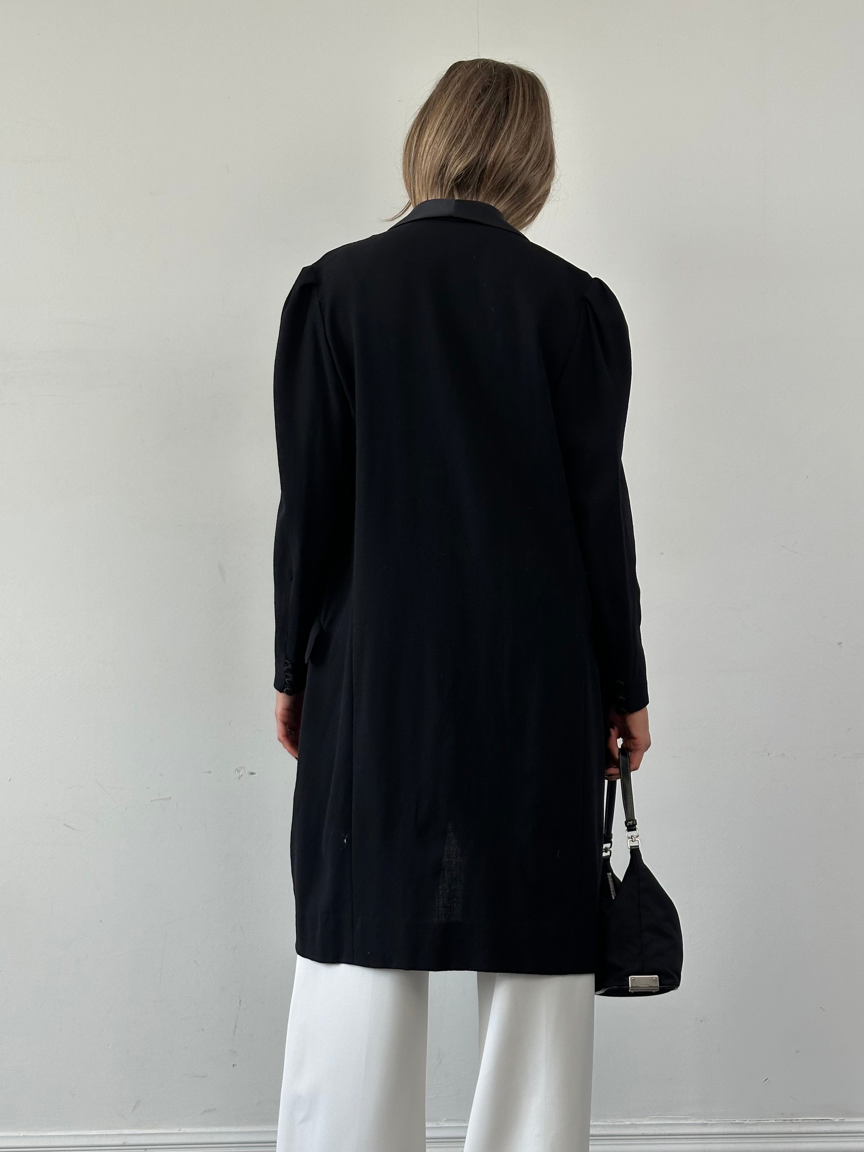 Jaeger lightweight double-breasted wool tuxedo coat in navy, tailored fit, with classic lapels and button details.