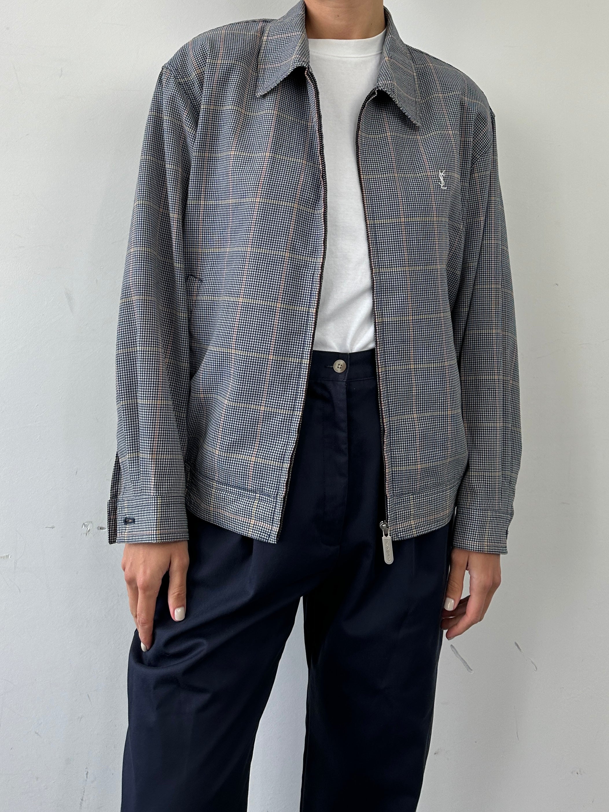 Yves Saint Laurent Pour Homme check logo bomber jacket in size L, black with bold check pattern and YSL branding on the front.