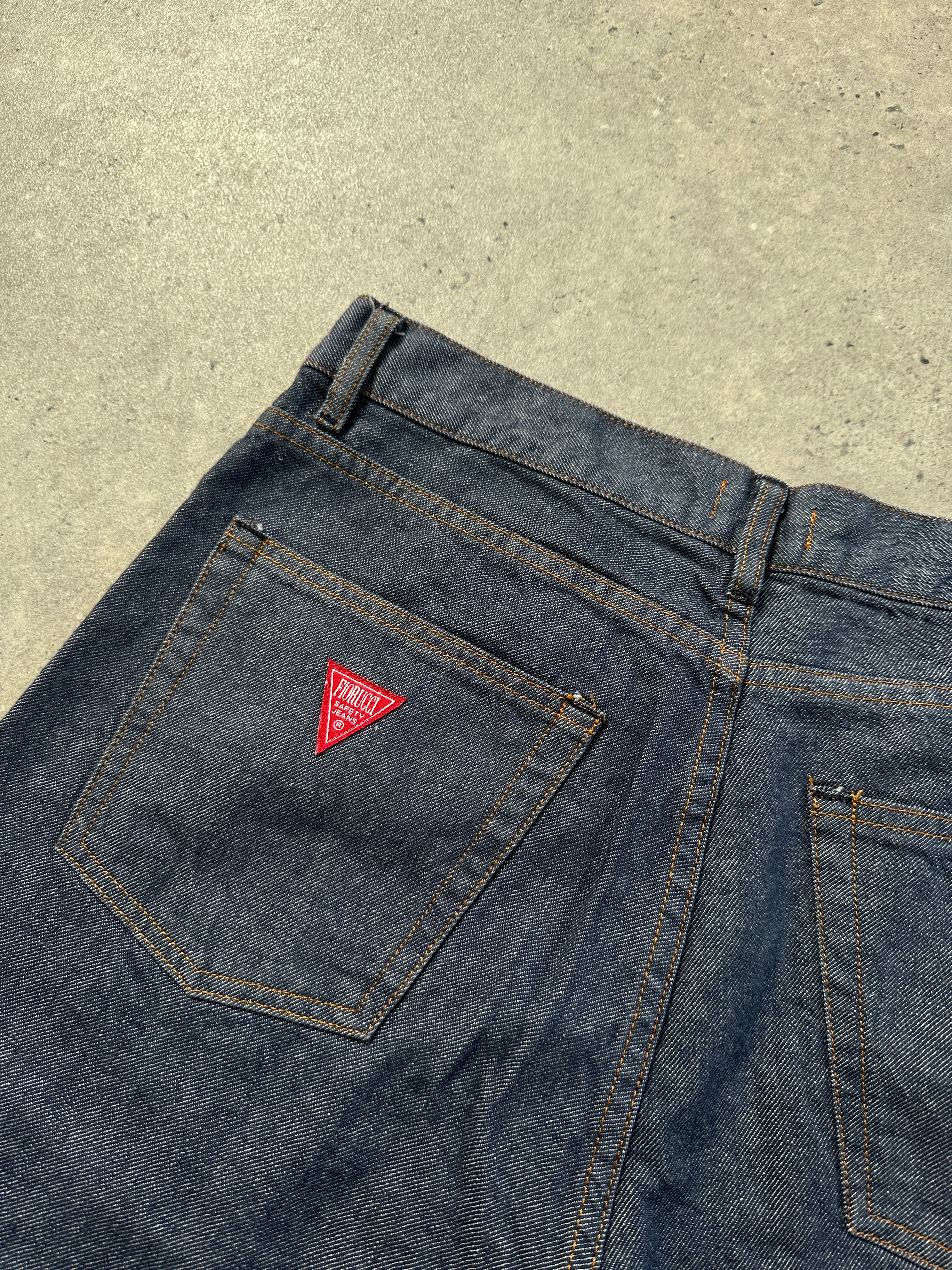 Fiorucci 1990s Safety Jean high-waisted straight-leg denim jeans in W32, showcasing classic blue denim and clean stitching.