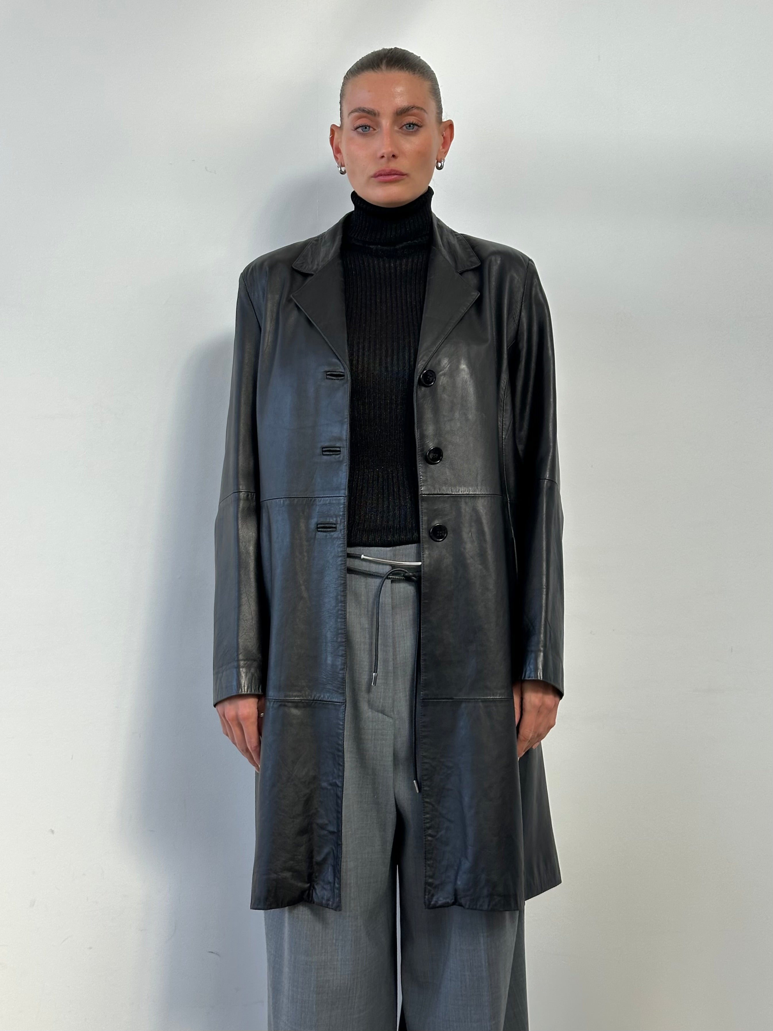 Vintage Italian vintage smooth leather trench coat jacket in size M, featuring classic design and high-quality craftsmanship.