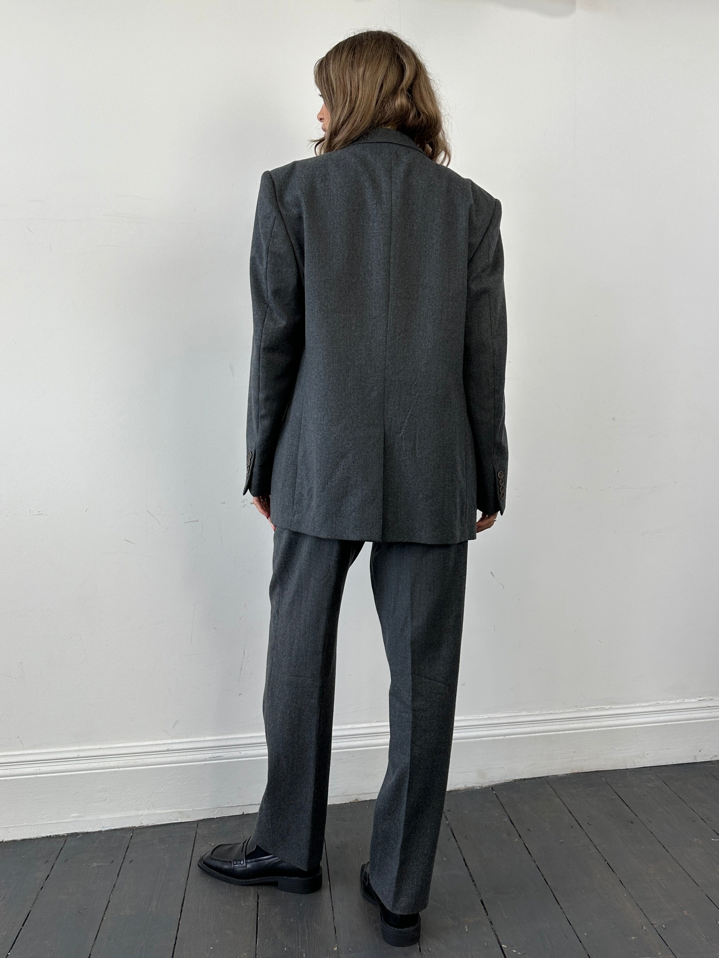 Missoni pure wool single-breasted jumpsuit in size 42R/W32, stylish and tailored with a classic fit and elegant design.