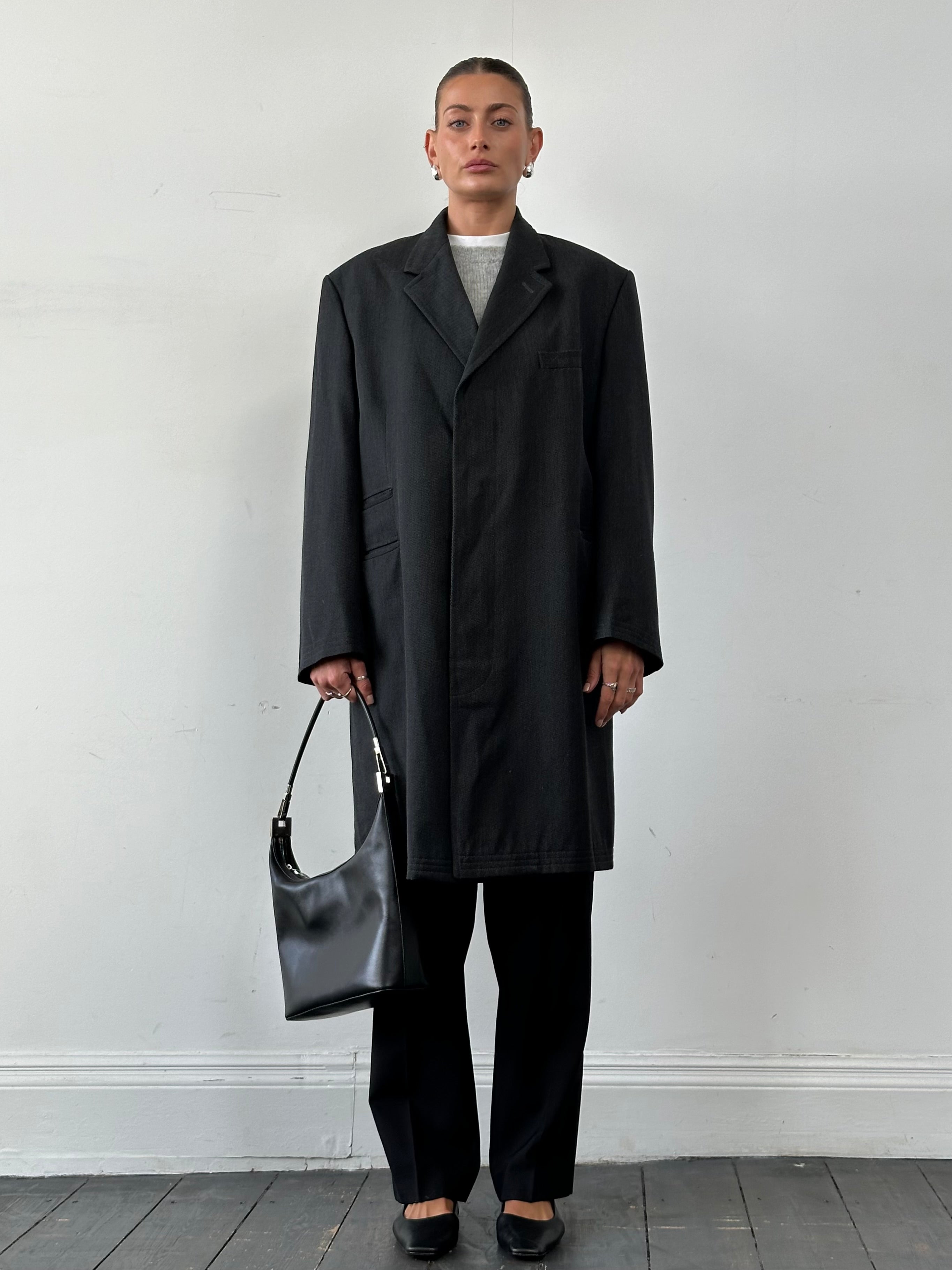 Burberry 1990s pure wool twill coat in XXL with concealed placket, featuring classic tailored design and neutral color.