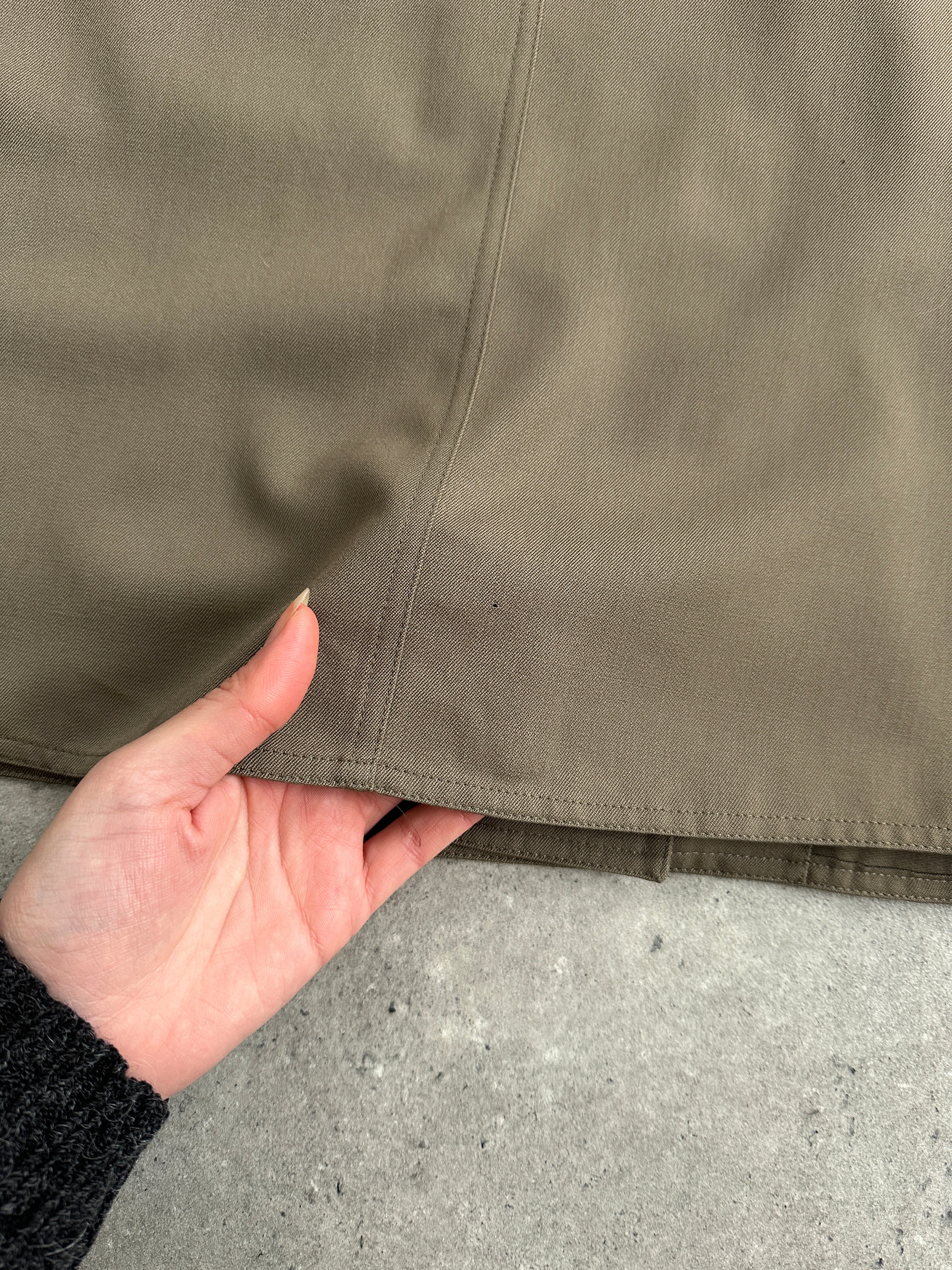 Marella Pure Wool Double Breasted Trench Coat in size L/XL, beige color, with classic lapels and button details, hanging on a hanger.