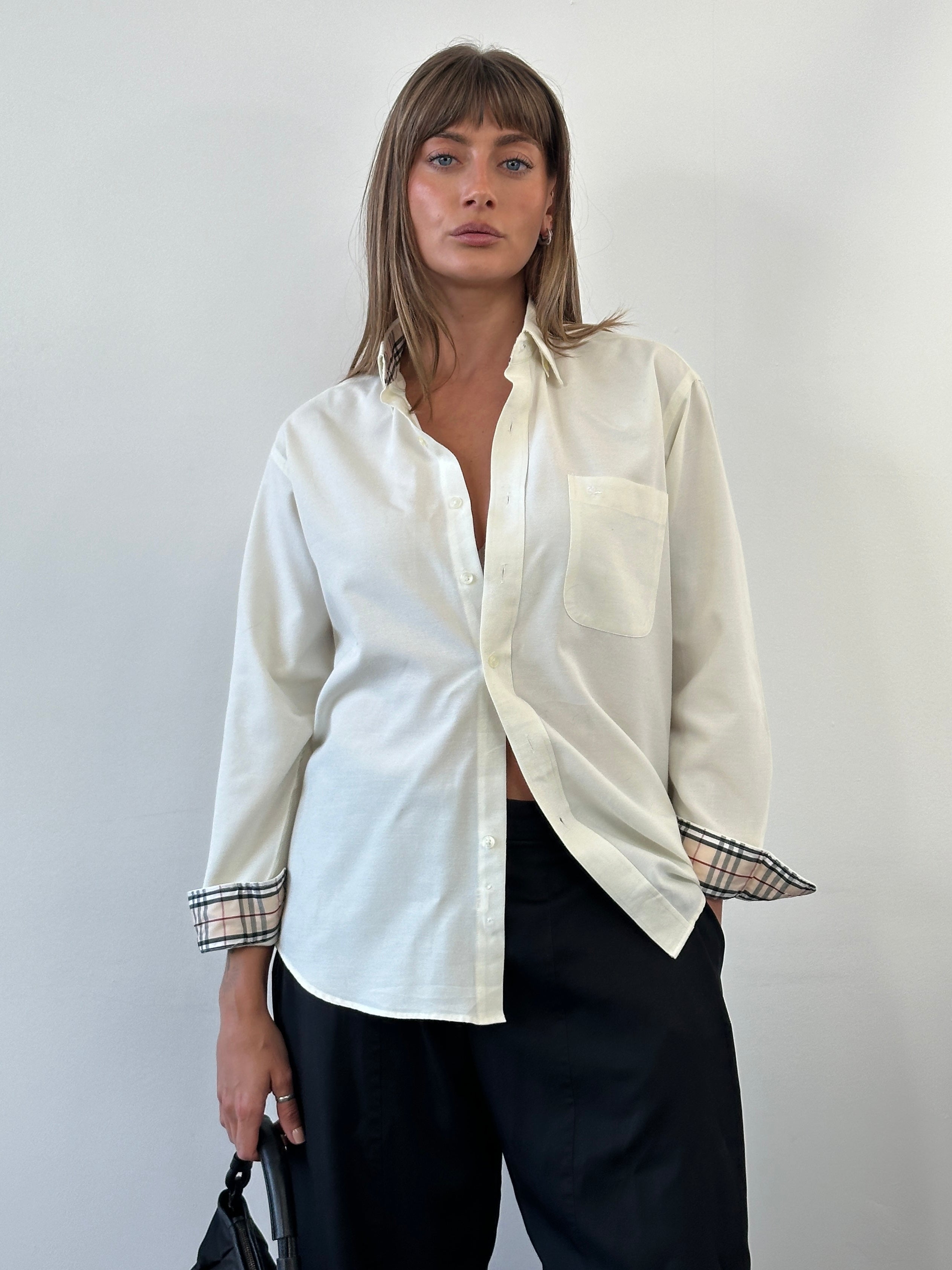Burberry London 1990s cotton logo shirt in size M, featuring classic Burberry branding and a button-up design.