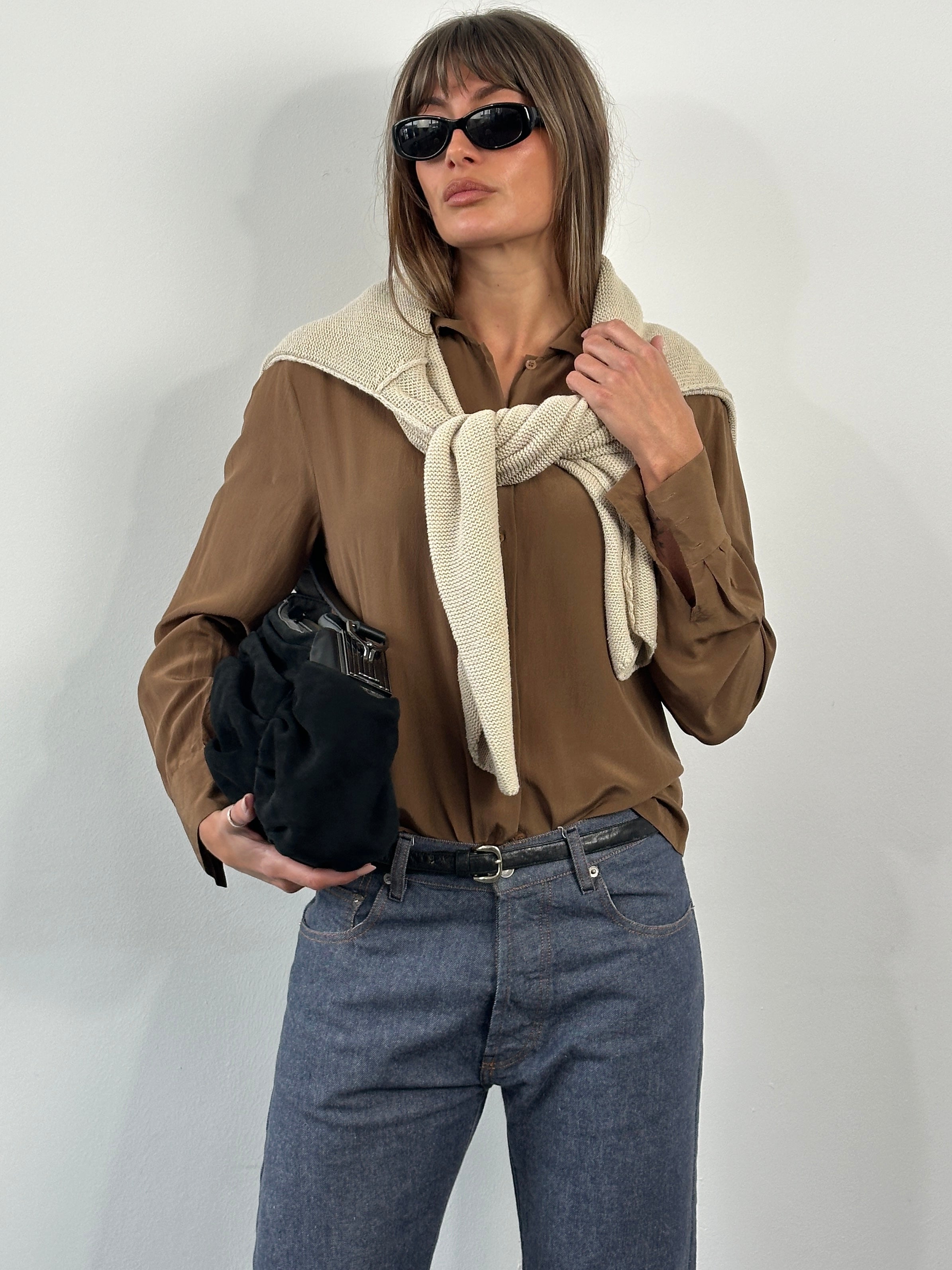 Vintage 2000s pure silk shirt in size S/M, featuring a classic style and smooth fabric, displayed on a hanger.