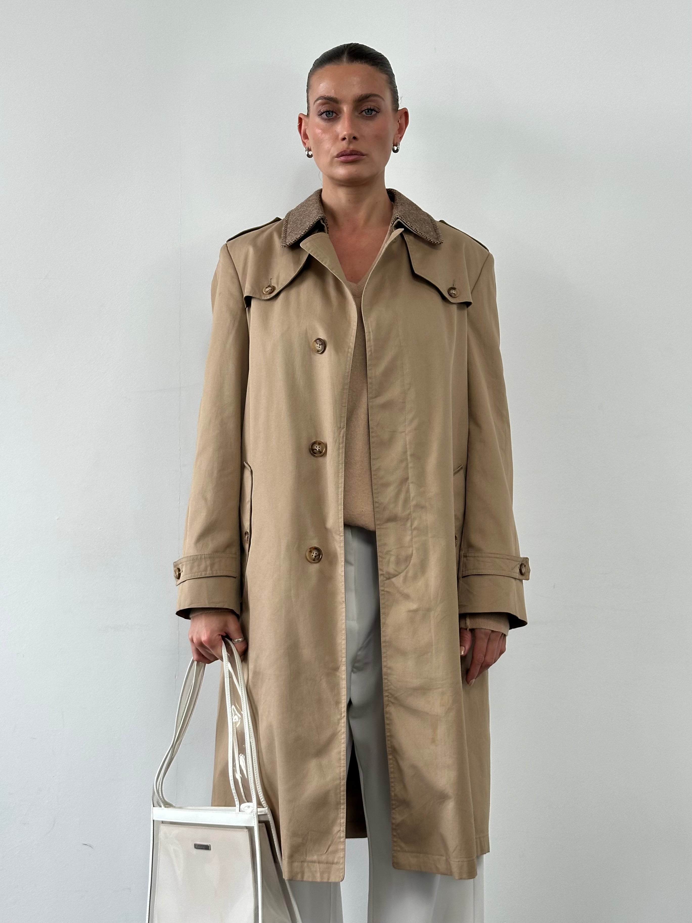 Christian Dior Monsieur cotton single-breasted belted trench coat in beige, displayed on a hanger.