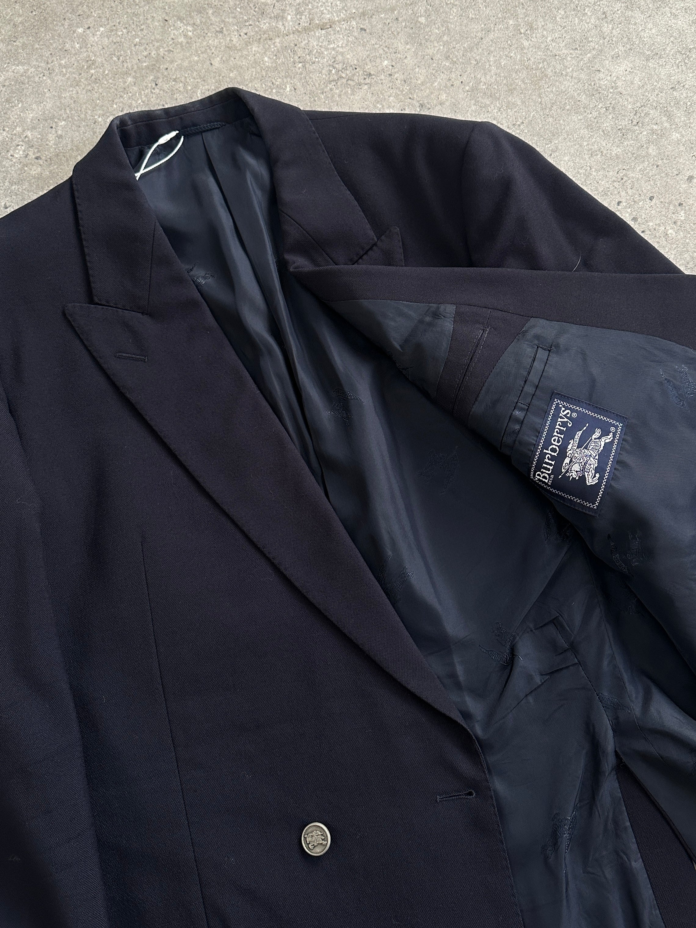 Burberry wool bespoke double-breasted blazer in size 44R/XL, featuring classic design and button details on a tailored fit.