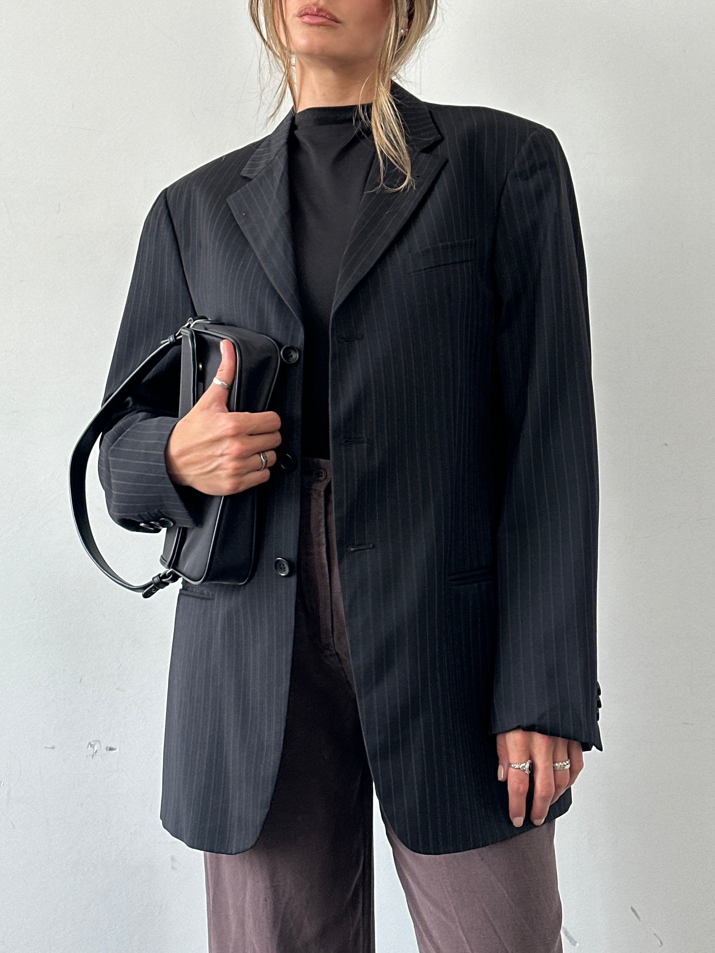 Armani Collezioni pinstripe pure wool single-breasted blazer in size 40R/L, featuring classic tailoring and notch lapels.