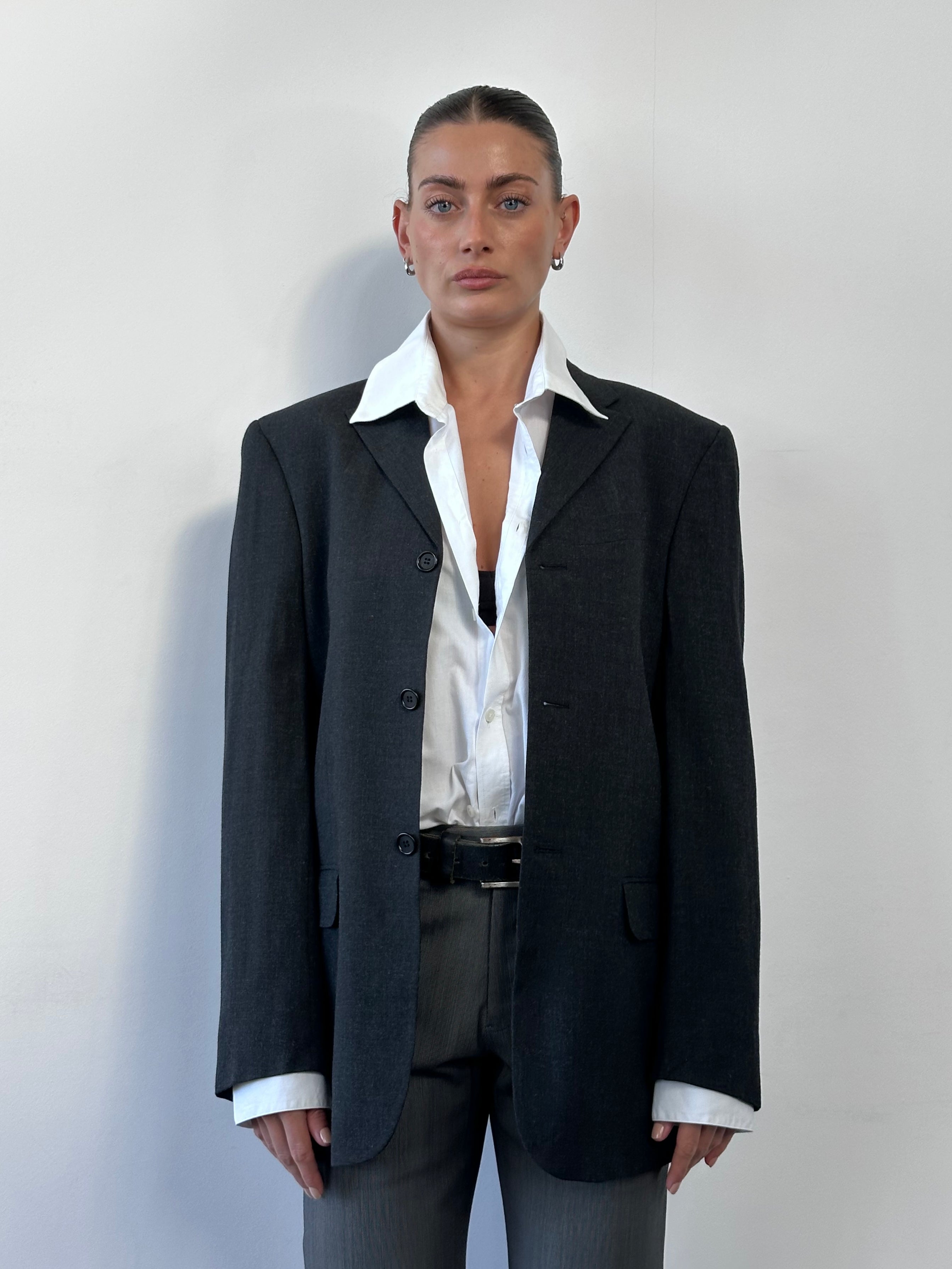 Valentino wool single-breasted blazer in size 36R/M, tailored fit with classic lapels and stylish design.