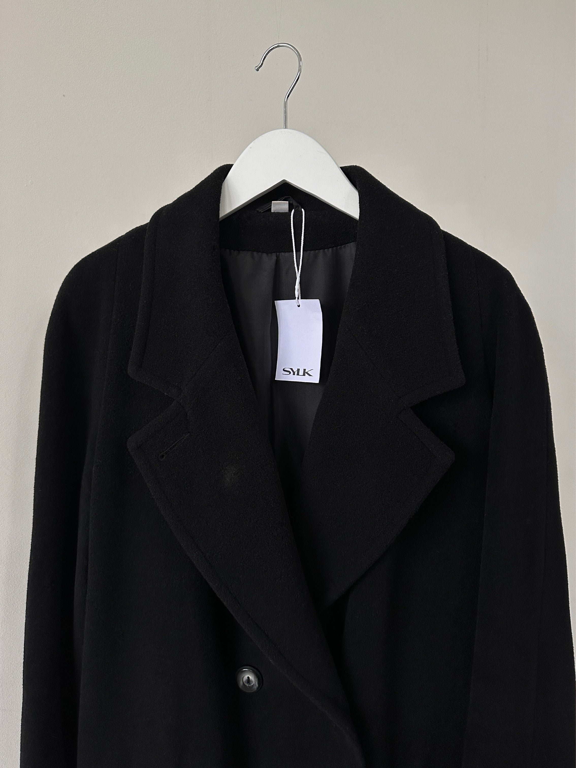 Vintage wool and cashmere double-breasted coat in size S, showcasing classic design and textured fabric.