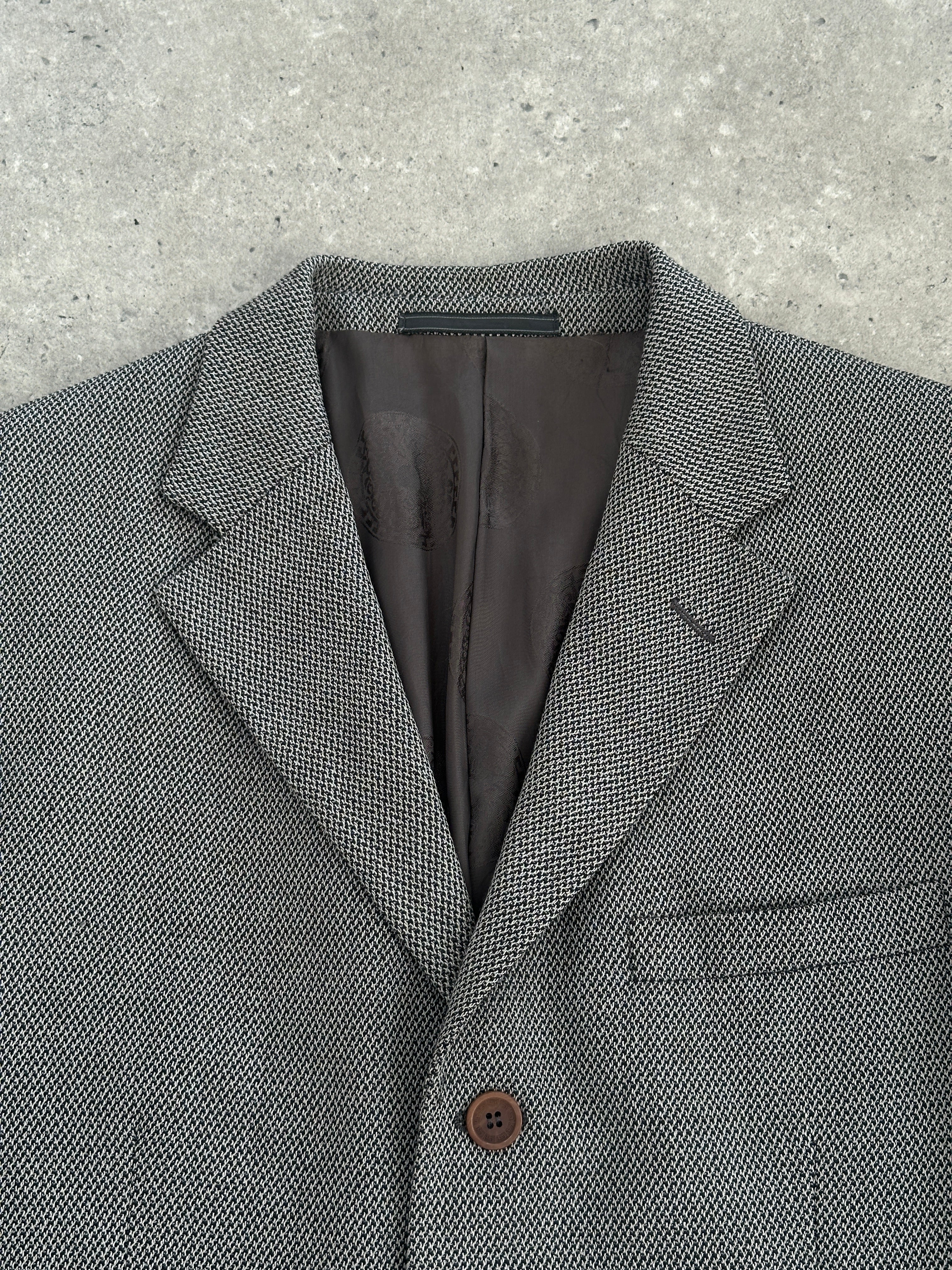 Versace Classic V2 90s woven single-breasted blazer in size 40R/M, featuring tailored fit and textured fabric.