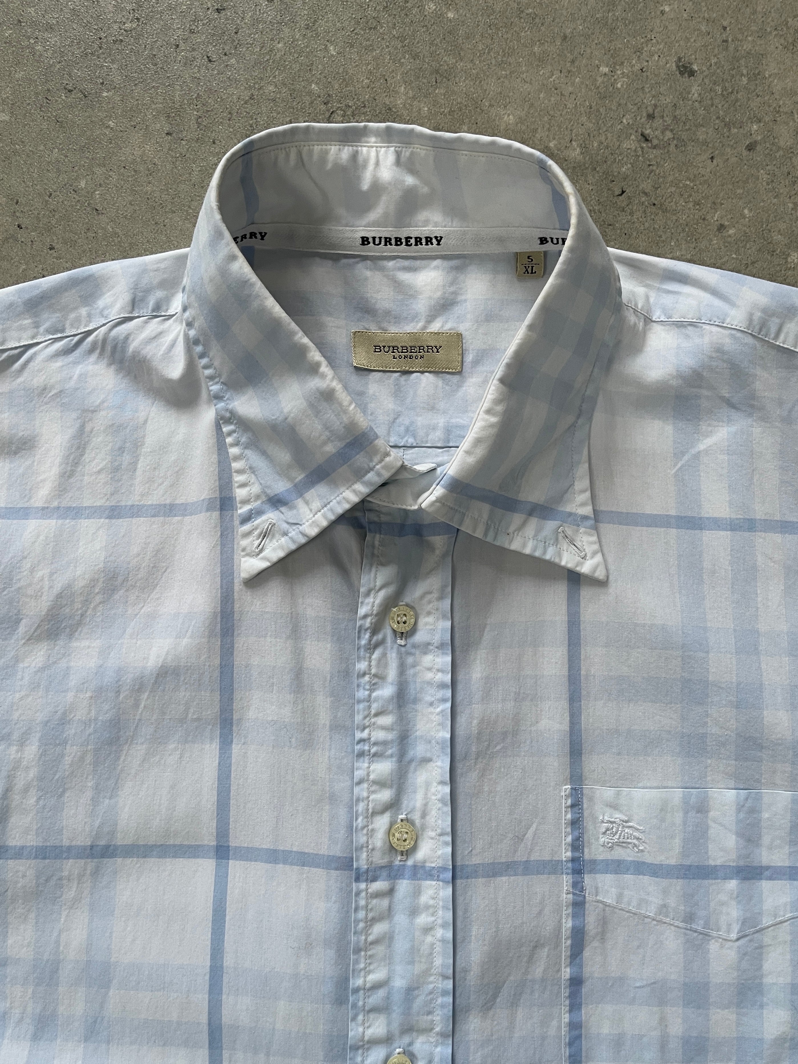 Burberry London 2000s cotton check shirt in XL with classic beige and black check pattern, front button closure, and collar.