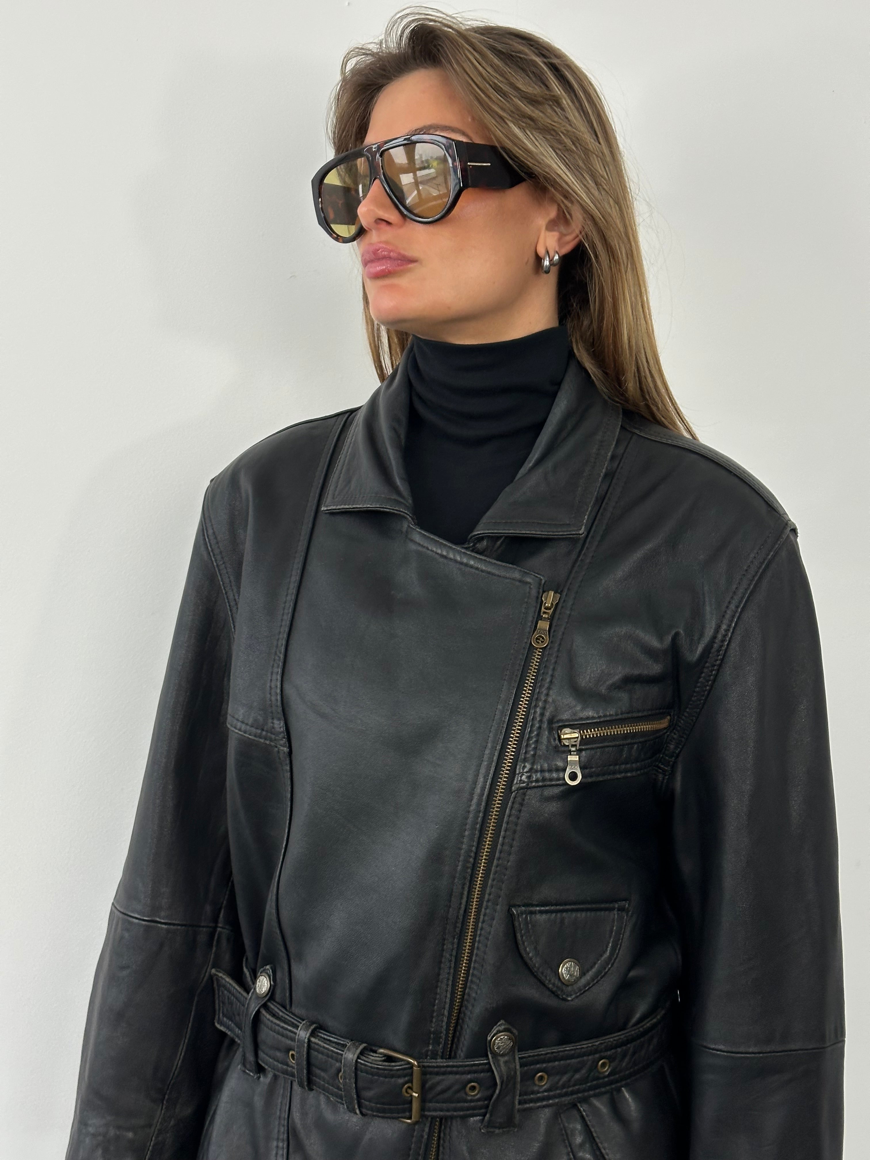 Vintage 1990s leather belted jacket, men's size M, showcasing classic distressed leather with belt detail and retro style.