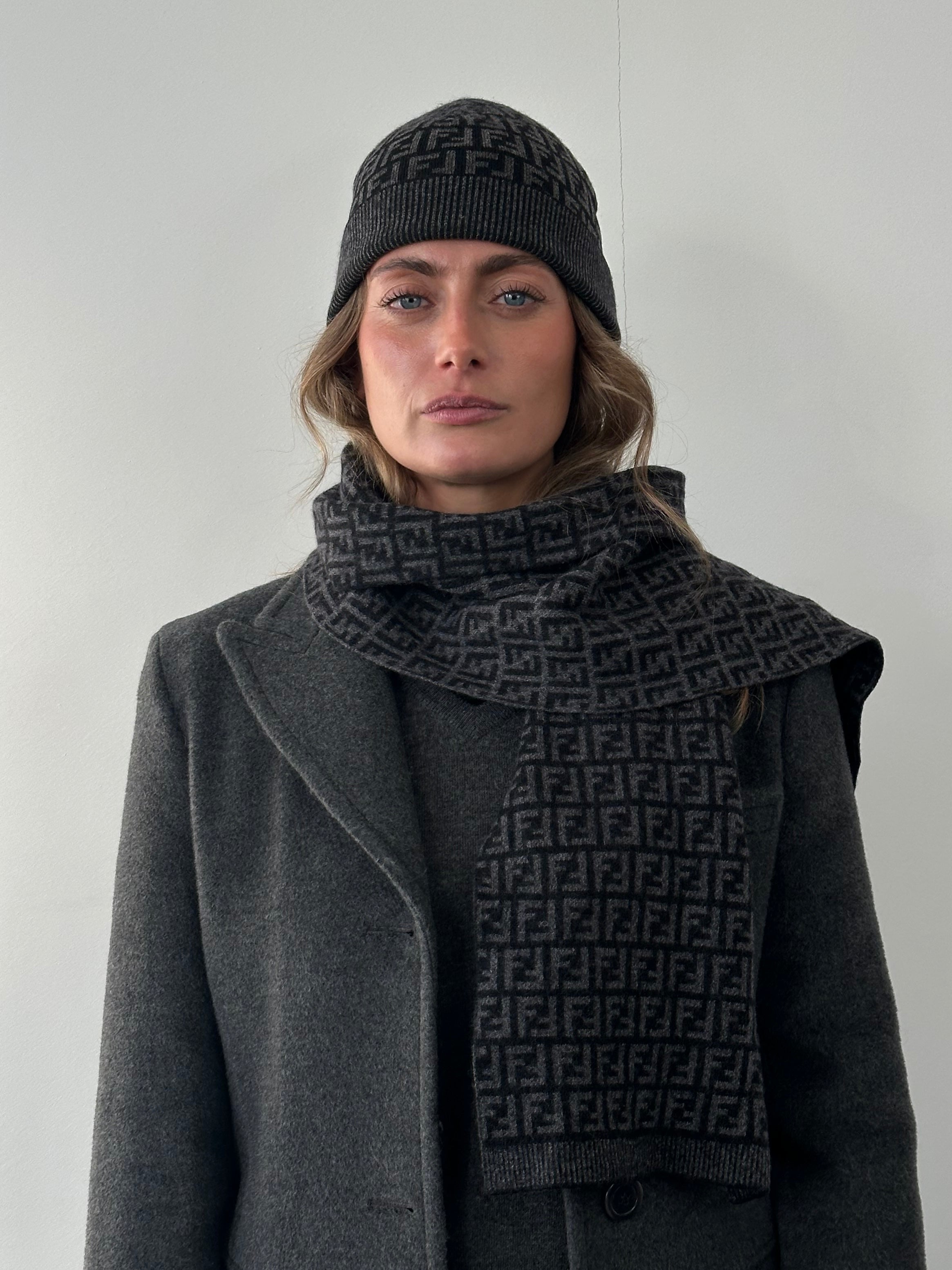 Fendi FF Monogram print beanie hat featuring the iconic logo pattern and knit fabric, designed for stylish warmth.